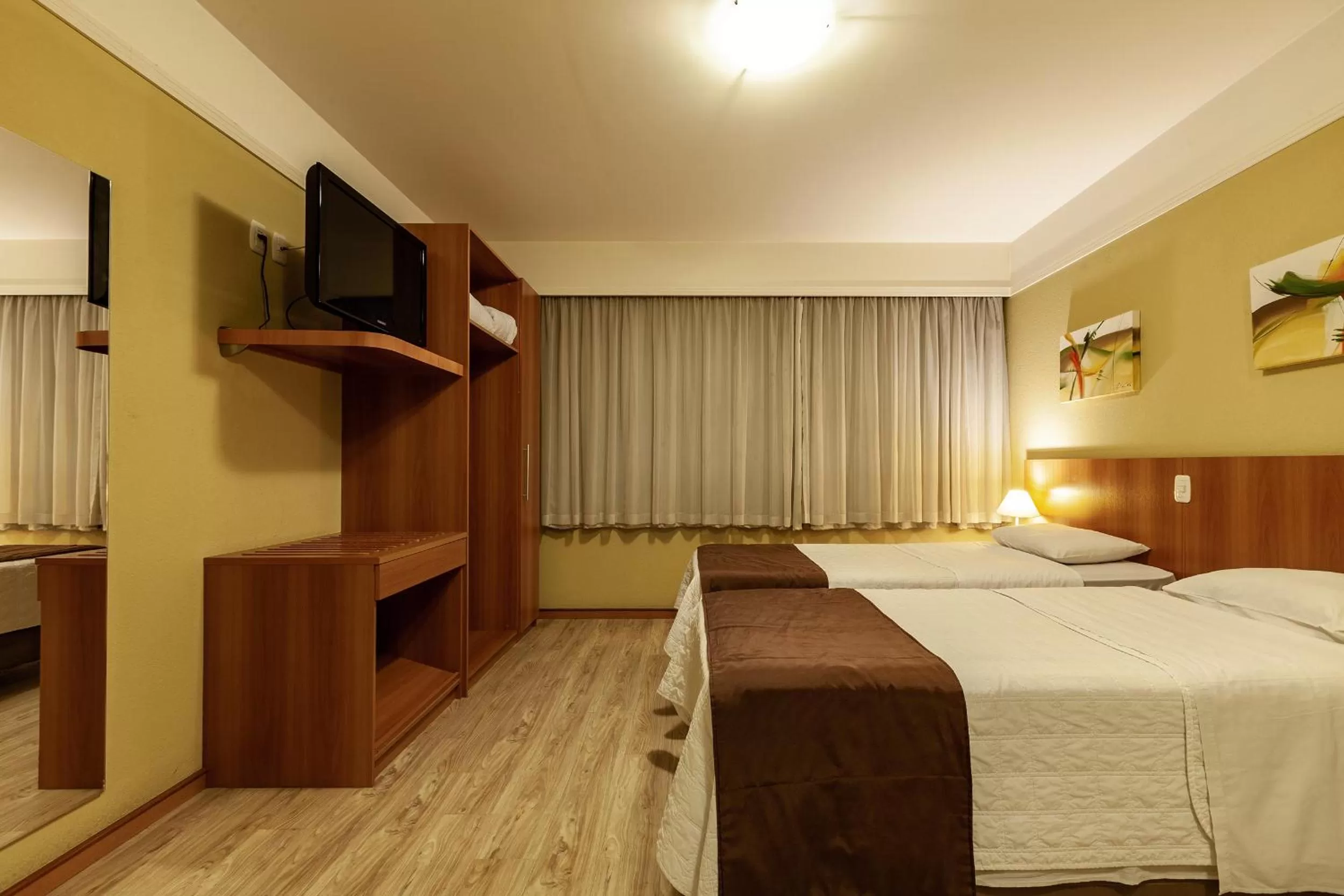 Bed in Tri Hotel Executive Caxias