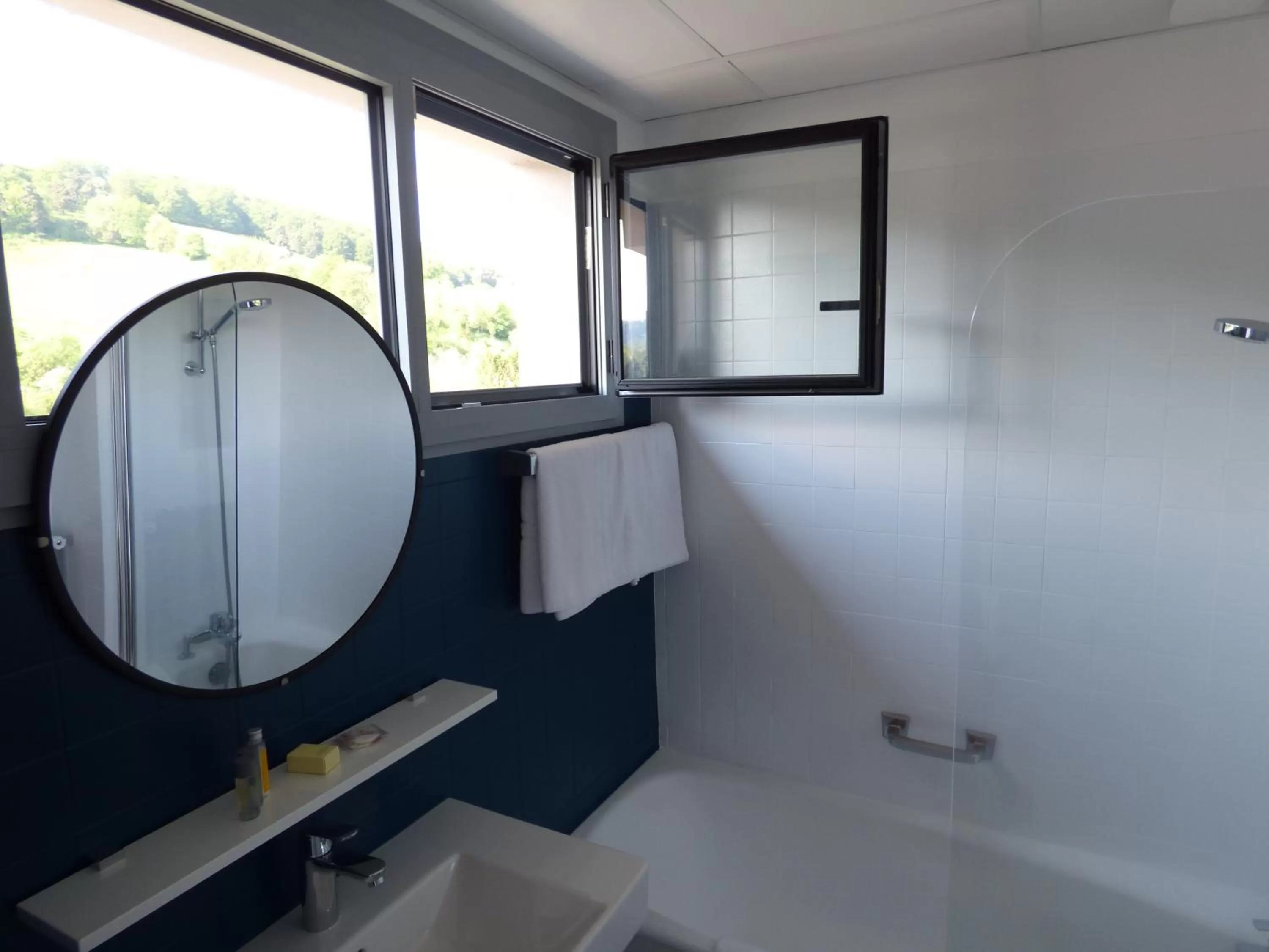 Bathroom in Cit'Hotel L'Etape