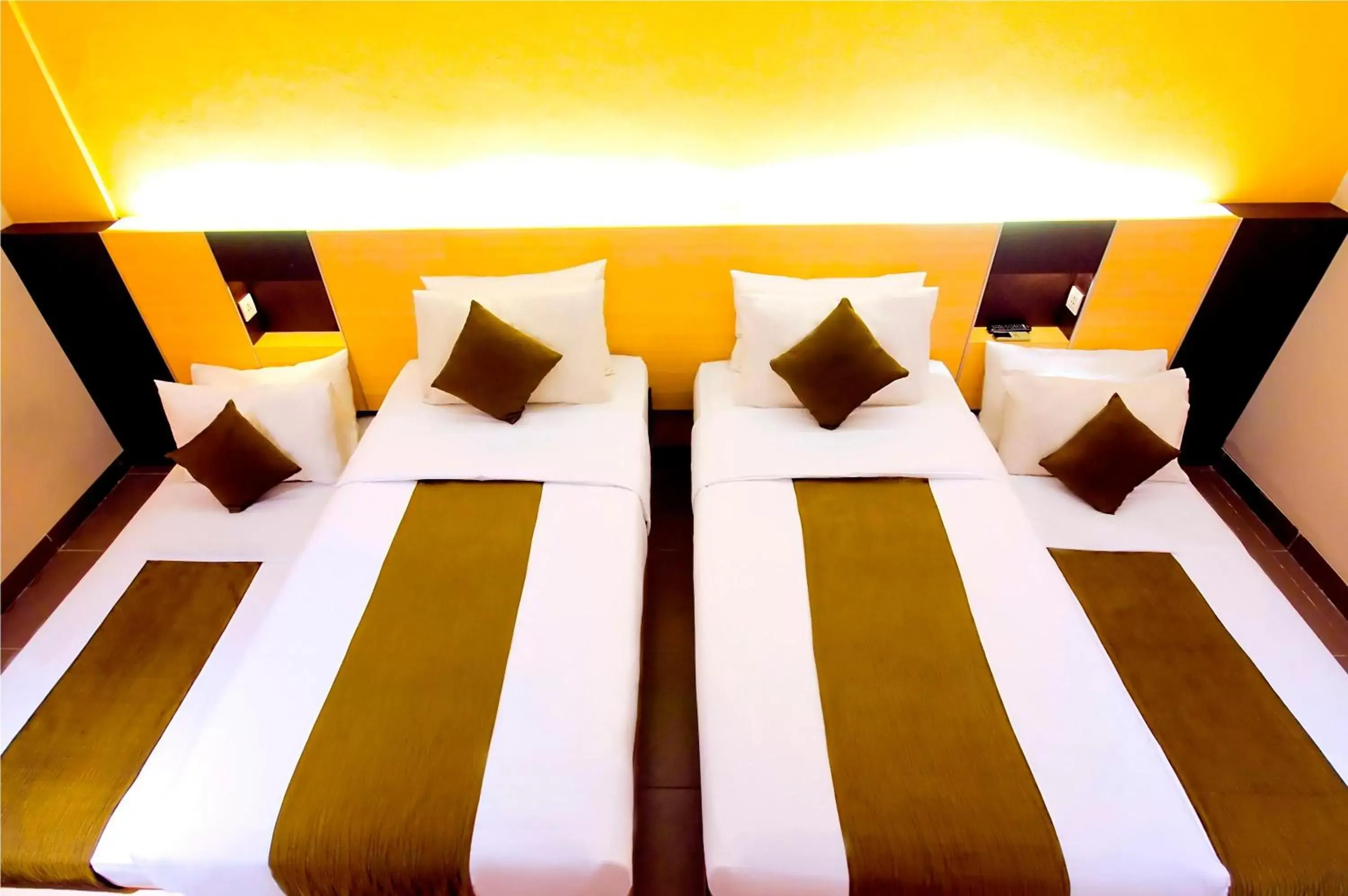 Bed in Sukajadi Hotel, Convention and Gallery