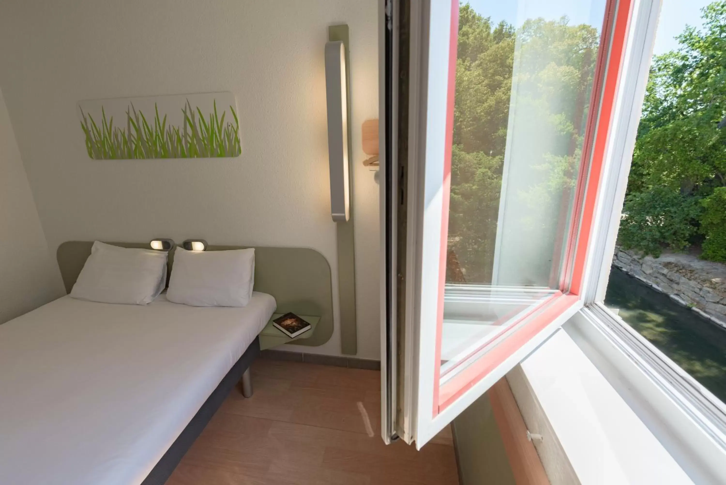 Bathroom, Bed in ibis budget Orange Centre