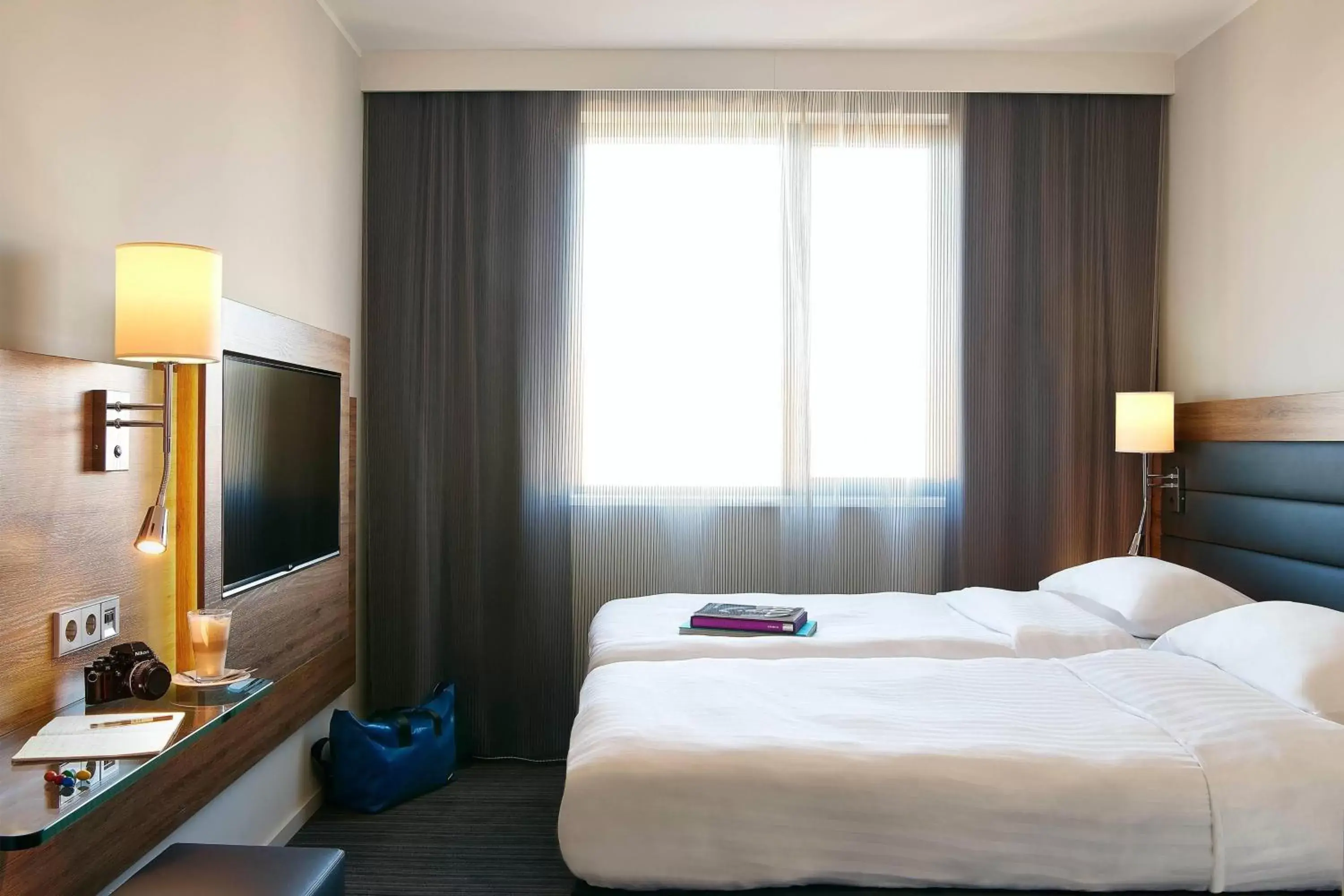 Photo of the whole room, Bed in Moxy Ludwigshafen