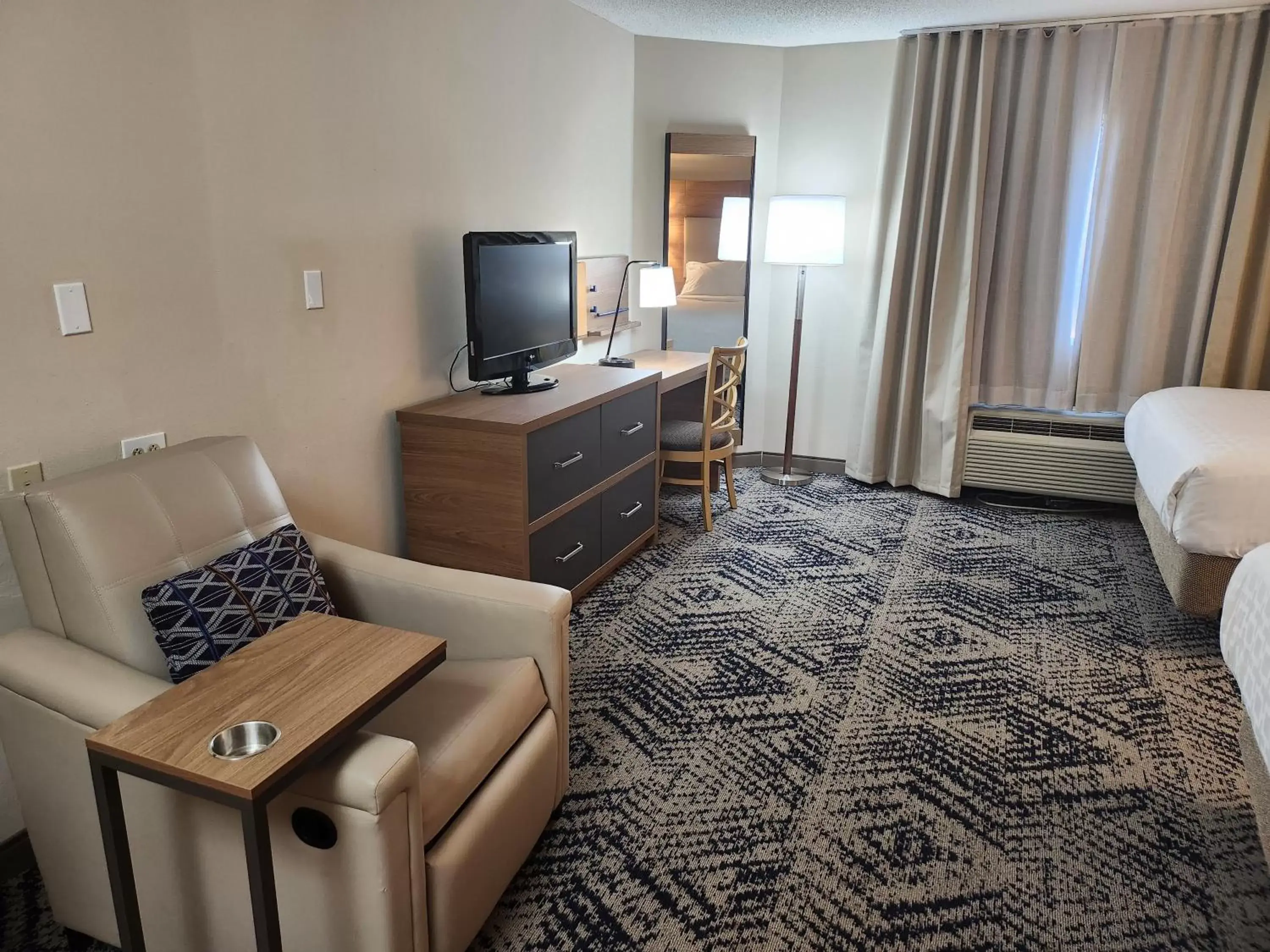 Photo of the whole room, TV/Entertainment Center in Candlewood Suites Harrisburg I-81 Hershey Area, an IHG Hotel