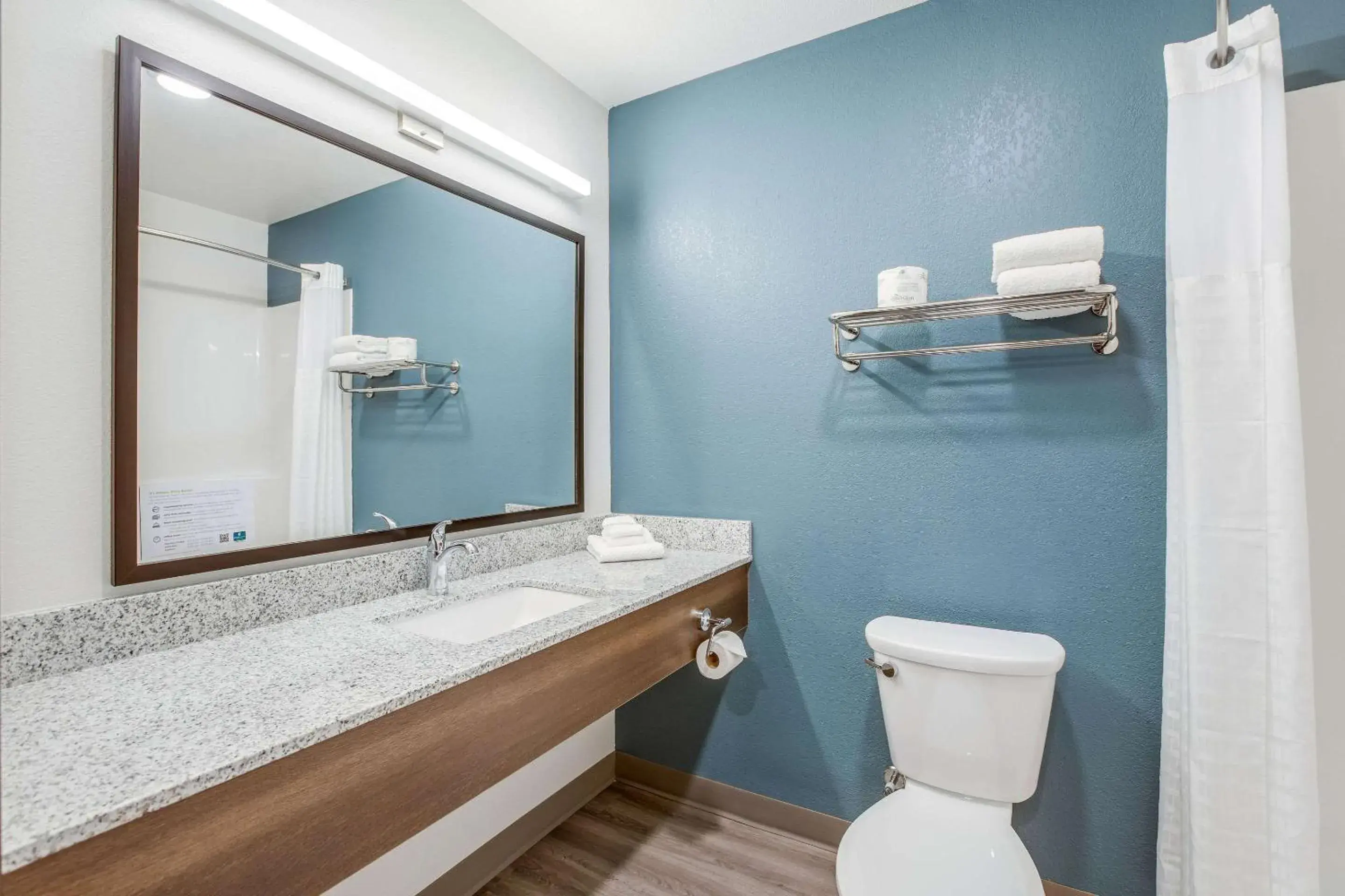Bathroom in WoodSpring Suites Detroit Farmington Hills