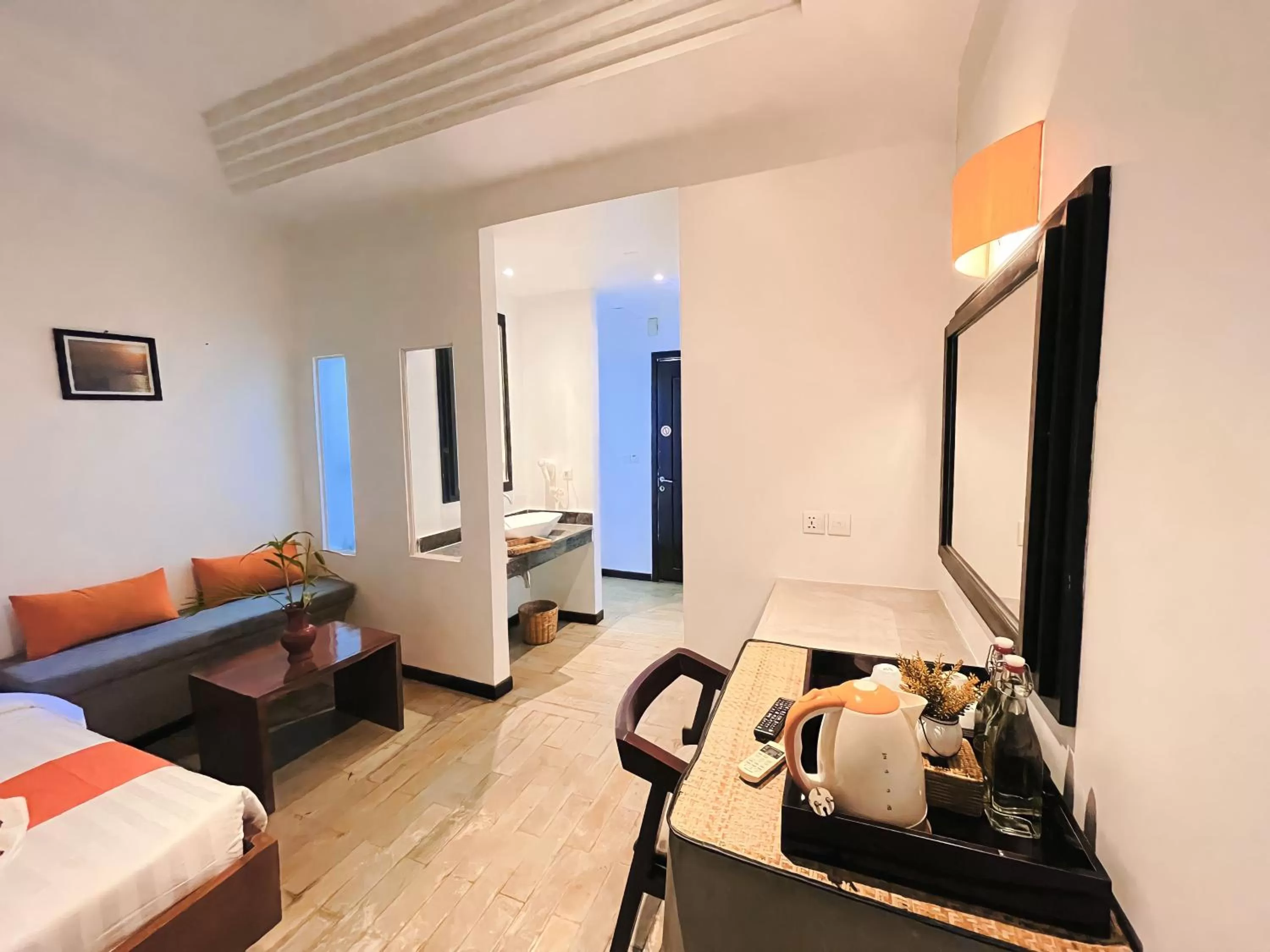 Seating area, Bed in Boutique Indochine d'Angkor