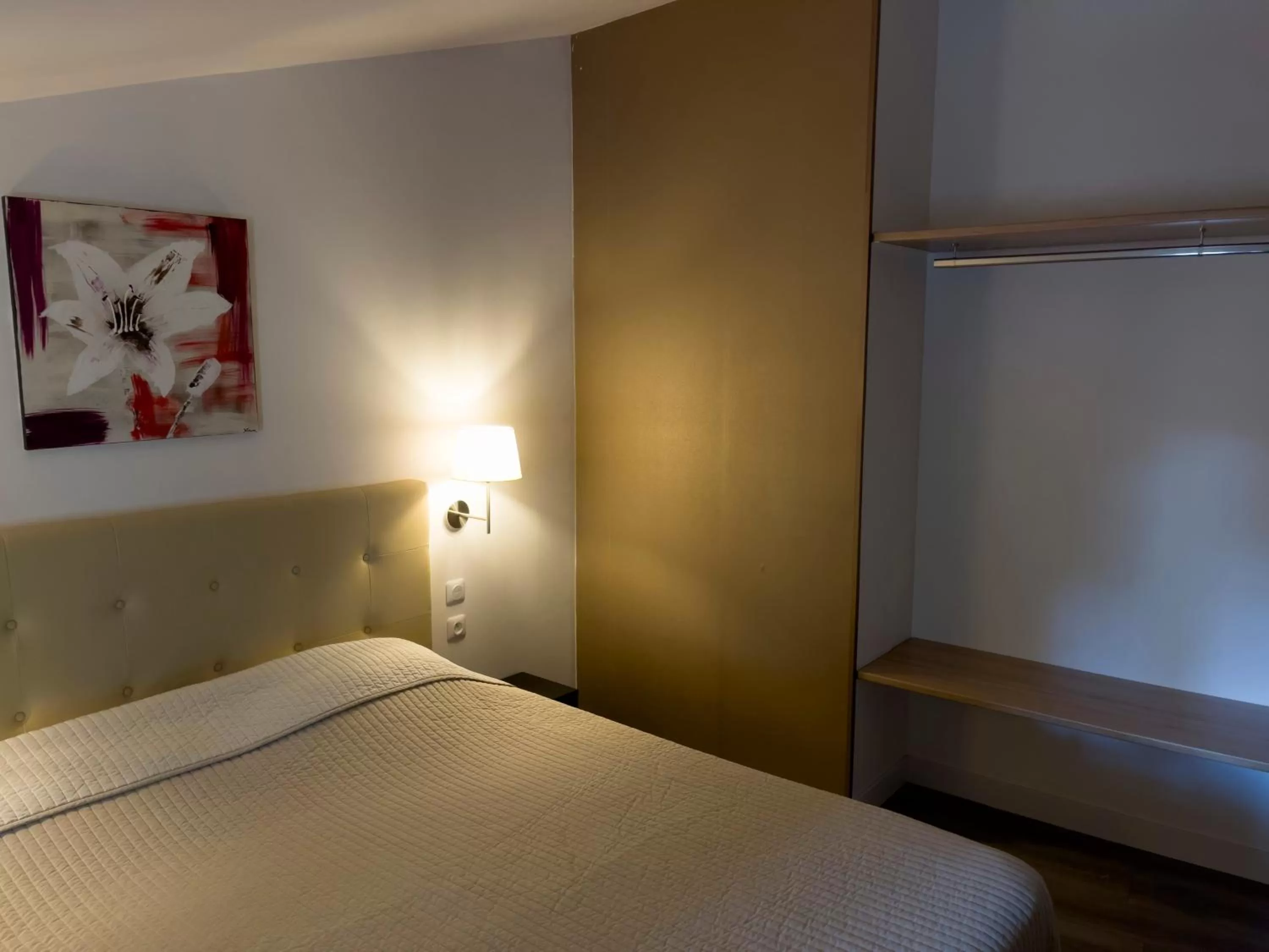 Bed in Le Grand Hôtel Molière