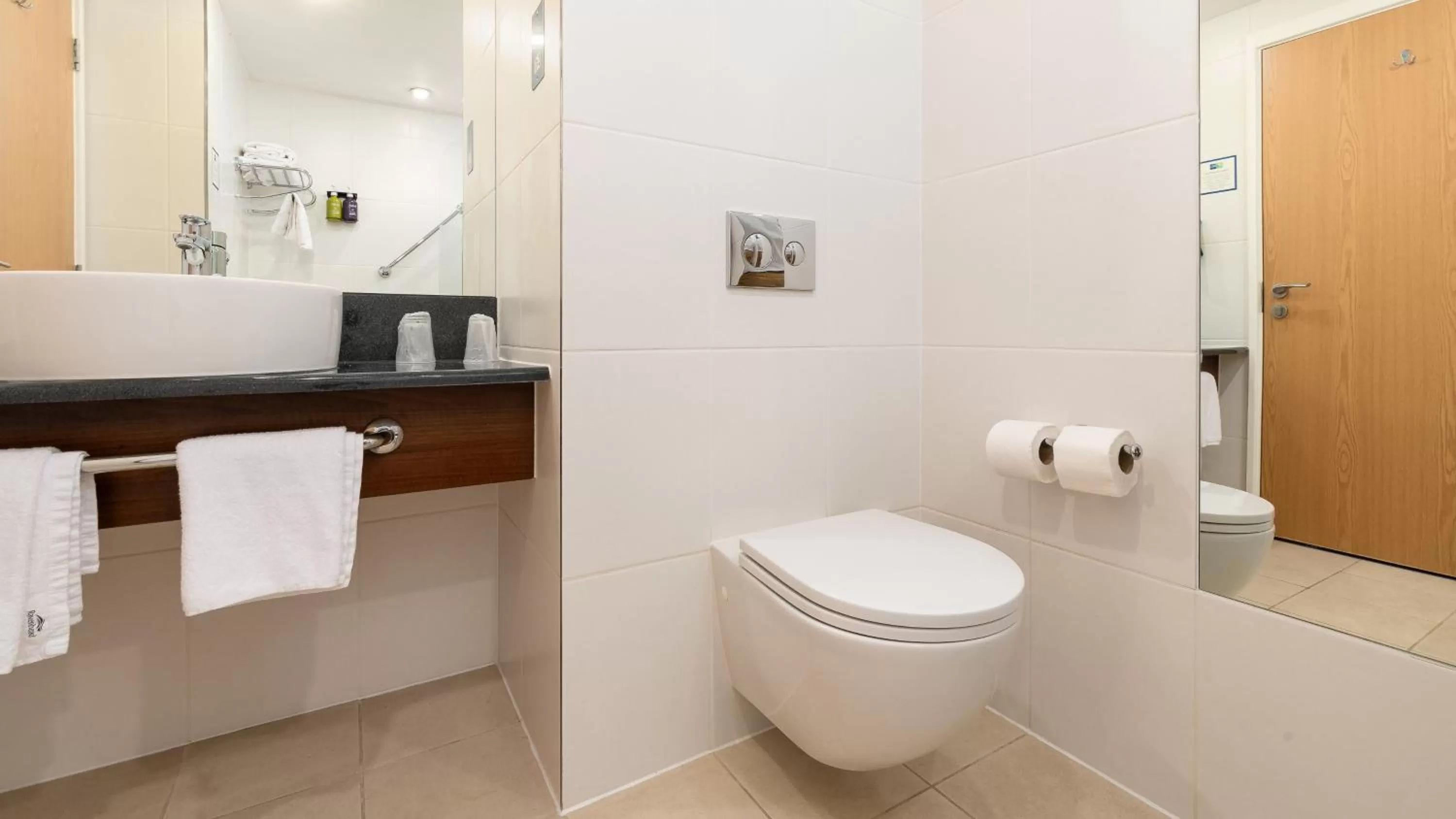 Bathroom in Holiday Inn Express Leigh - Sports Village by IHG