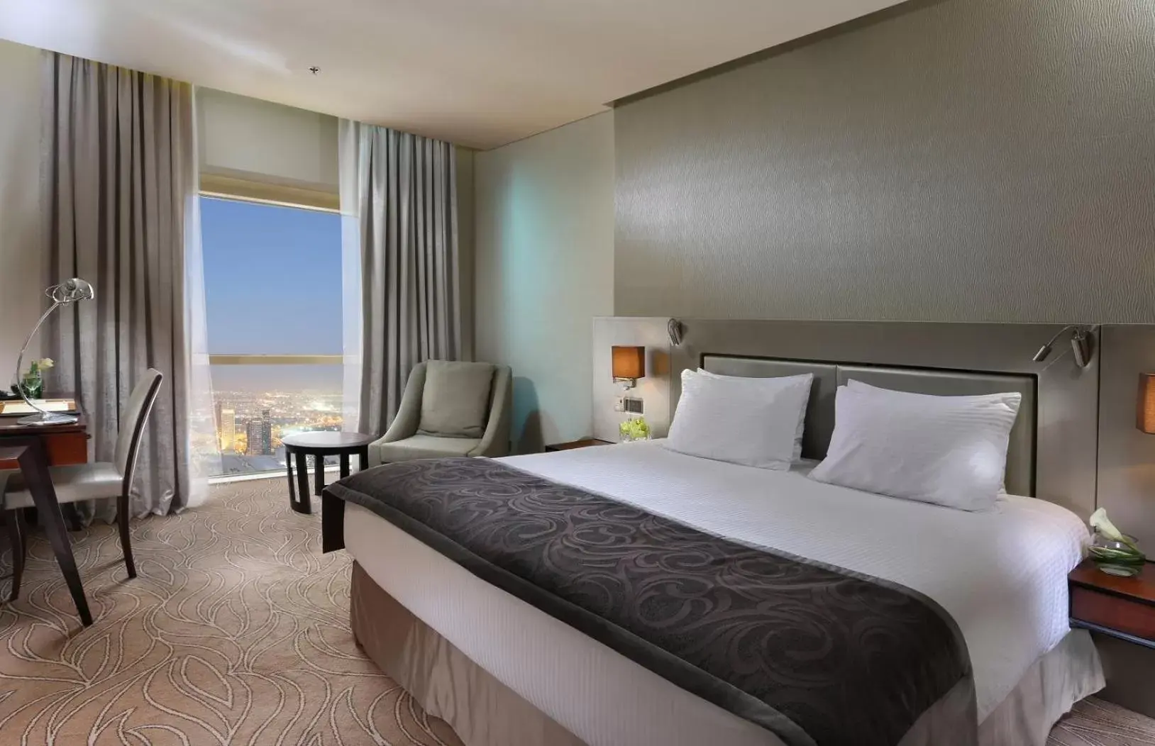 Bed in The Tower Plaza Hotel Dubai