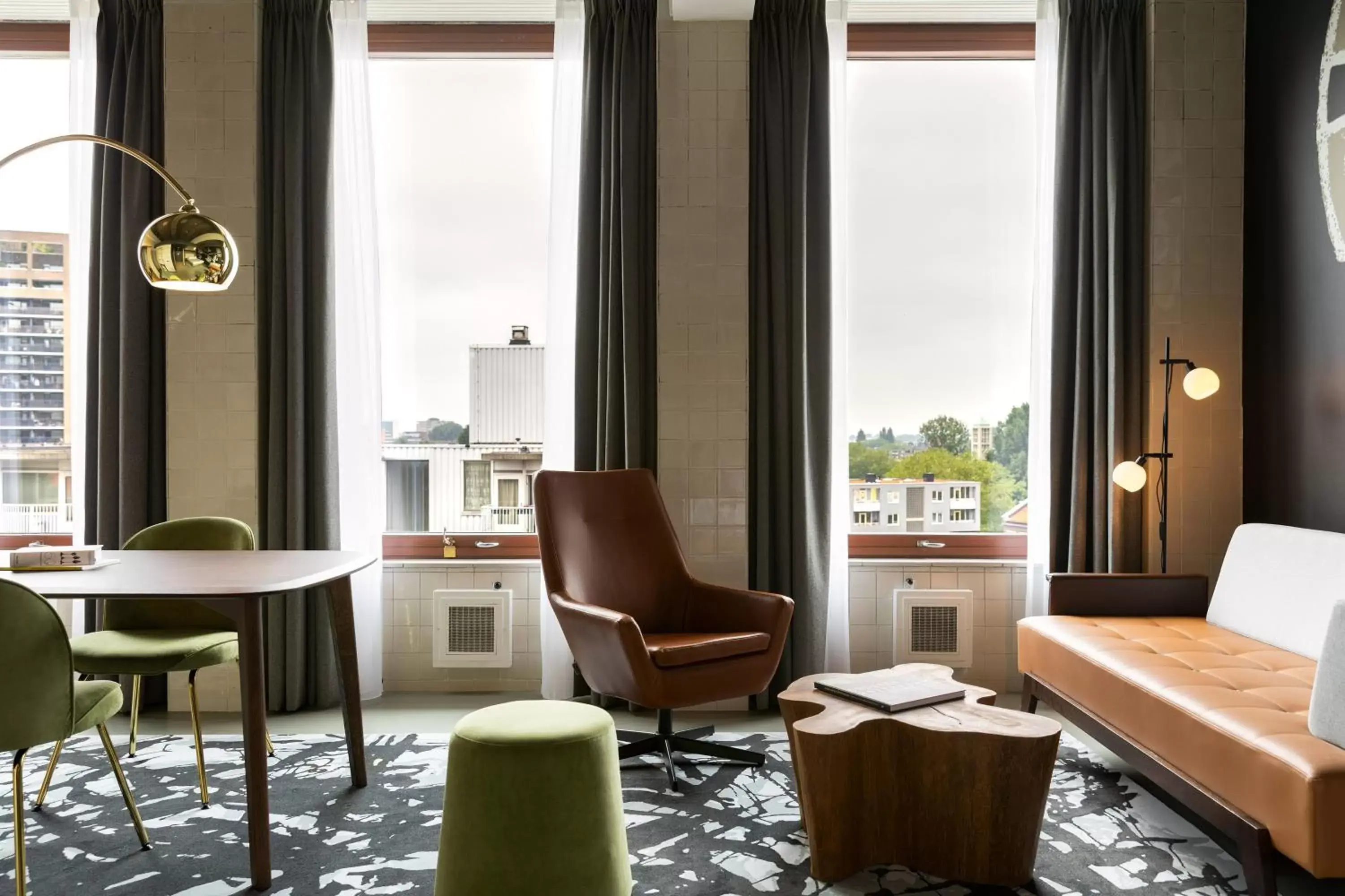 Photo of the whole room, Seating Area in The Slaak Rotterdam, a Tribute Portfolio Hotel