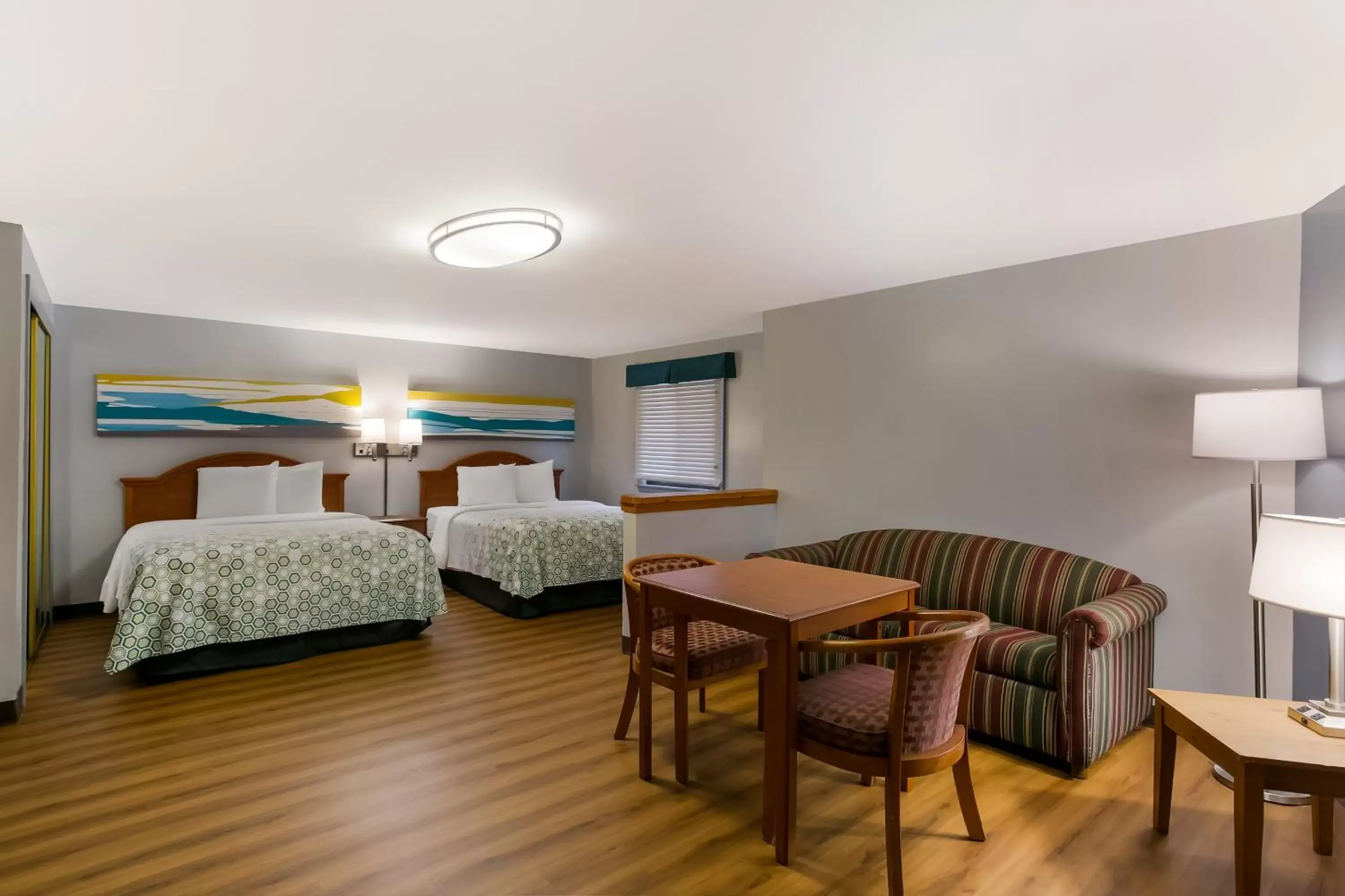 Bedroom, Bed in HomeTowne Studios by Red Roof Denver, PA Bedroom, Bed in HomeTowne Studios by Red Roof Denver, PA