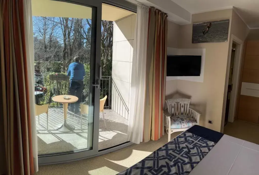 Balcony/Terrace, Bed in Hotel Sporting Brugherio Balcony/Terrace, Bed in Hotel Sporting Brugherio