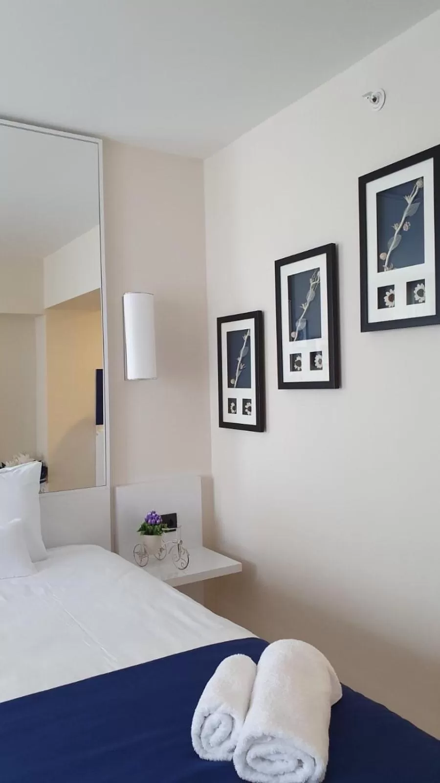 Bed in Orbi City Luxury Suite