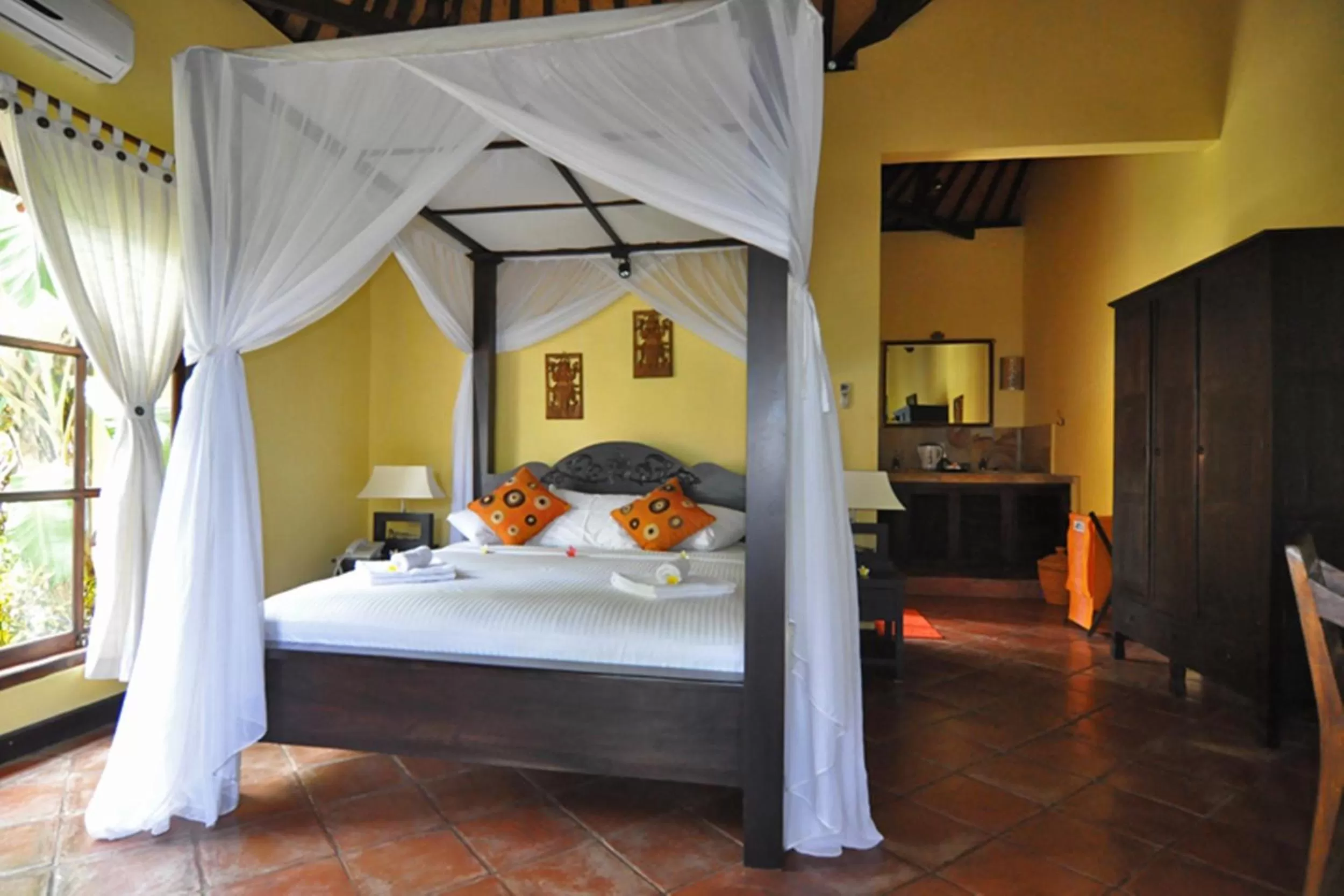 Photo of the whole room, Bed in Puri Mangga Sea View Resort and Spa