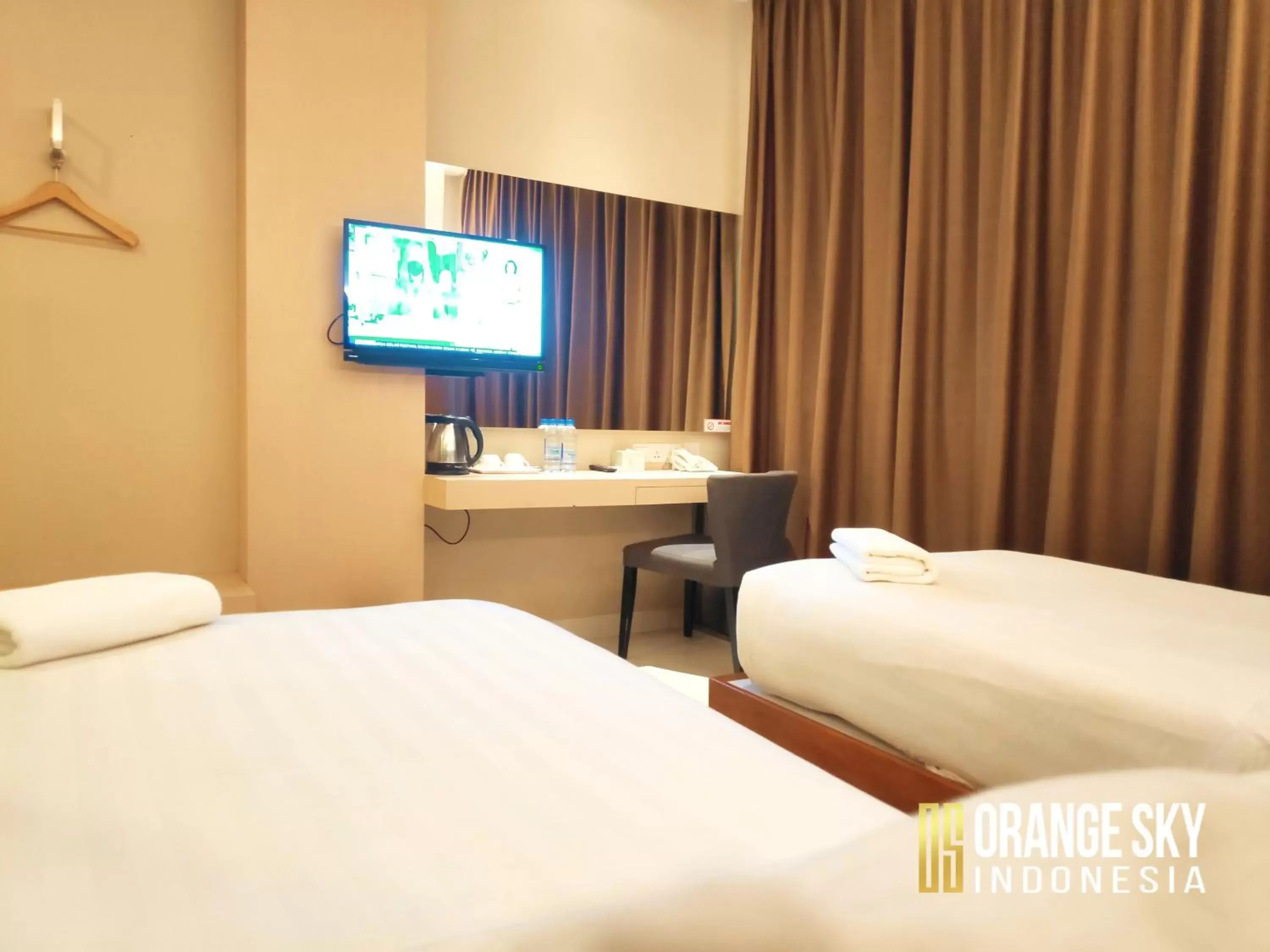 Bed in OS Hotel Airport Batam