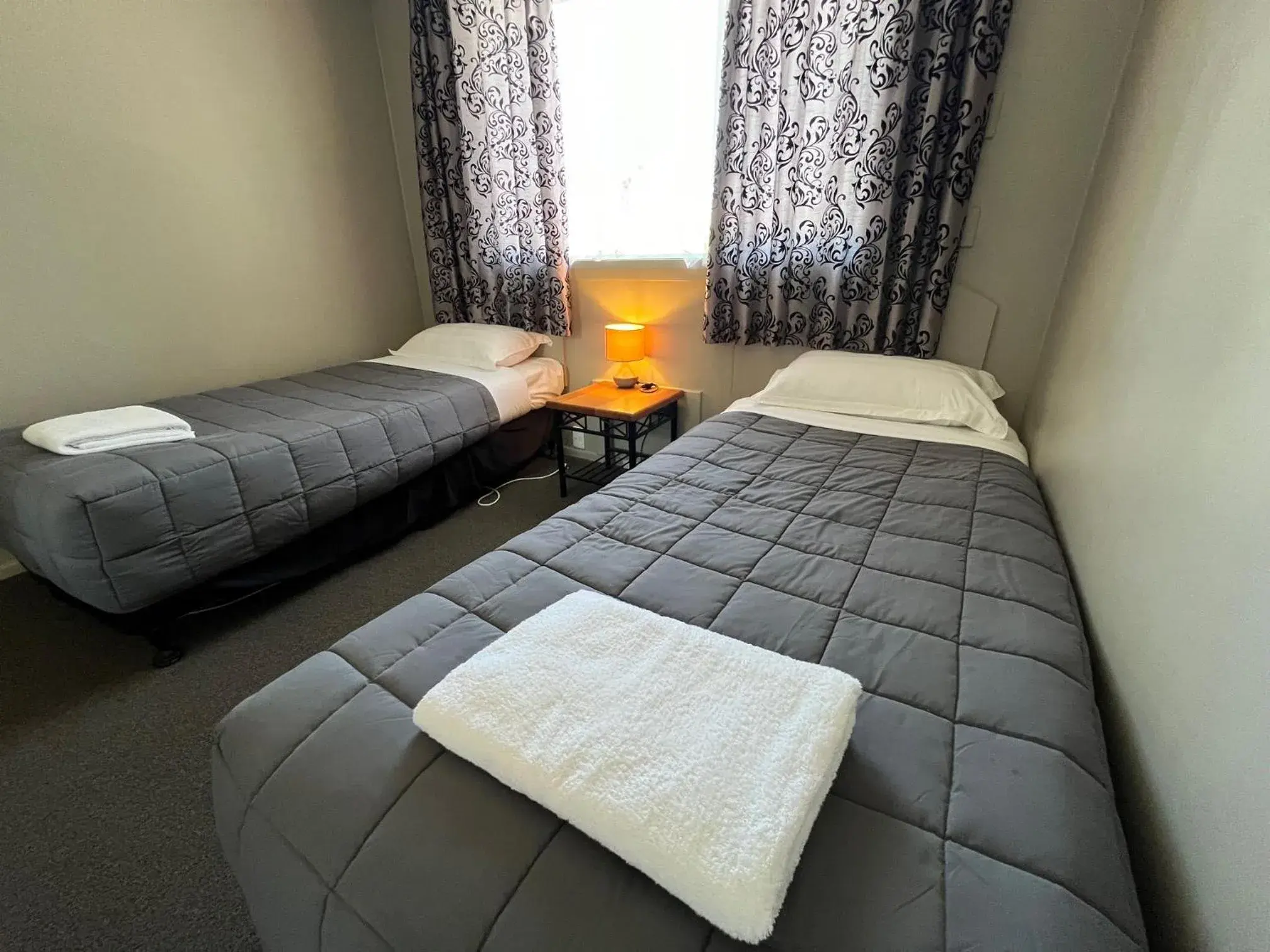 Bed in Manuka Crescent Motel