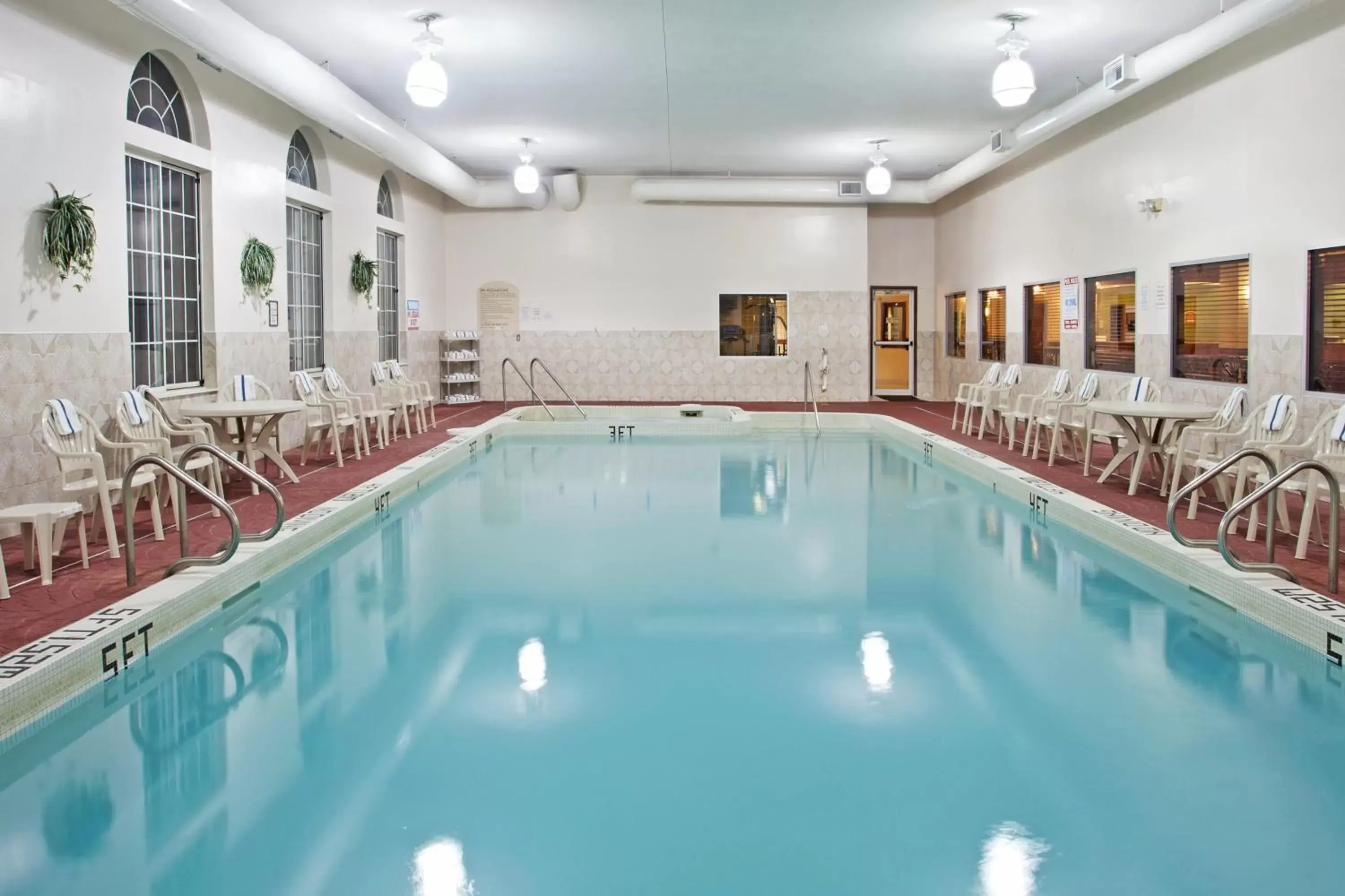 Swimming Pool in Holiday Inn Express Birch Run-Frankenmuth Area, an IHG Hotel