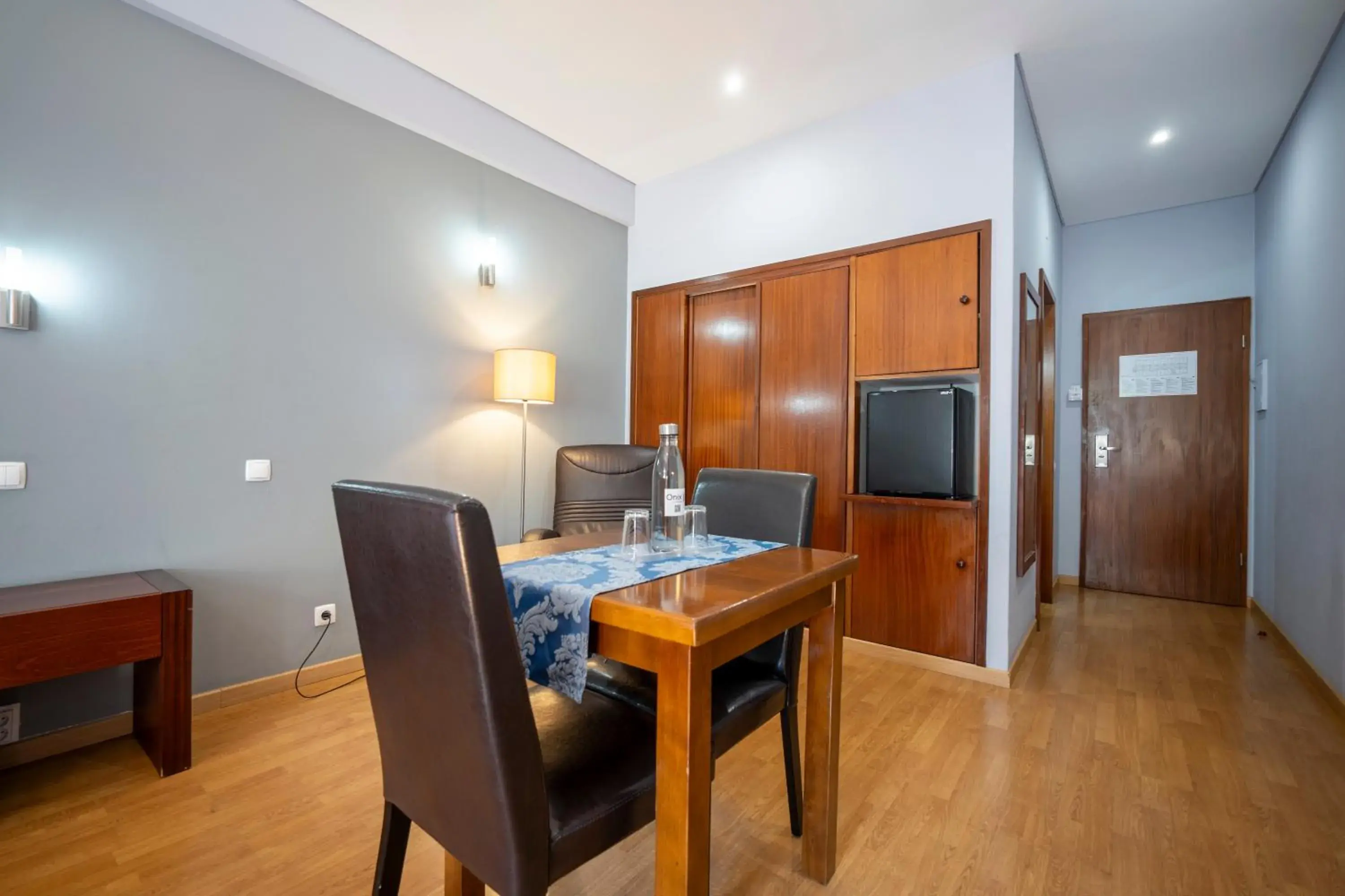 Bedroom, Dining Area in Hotel Onix