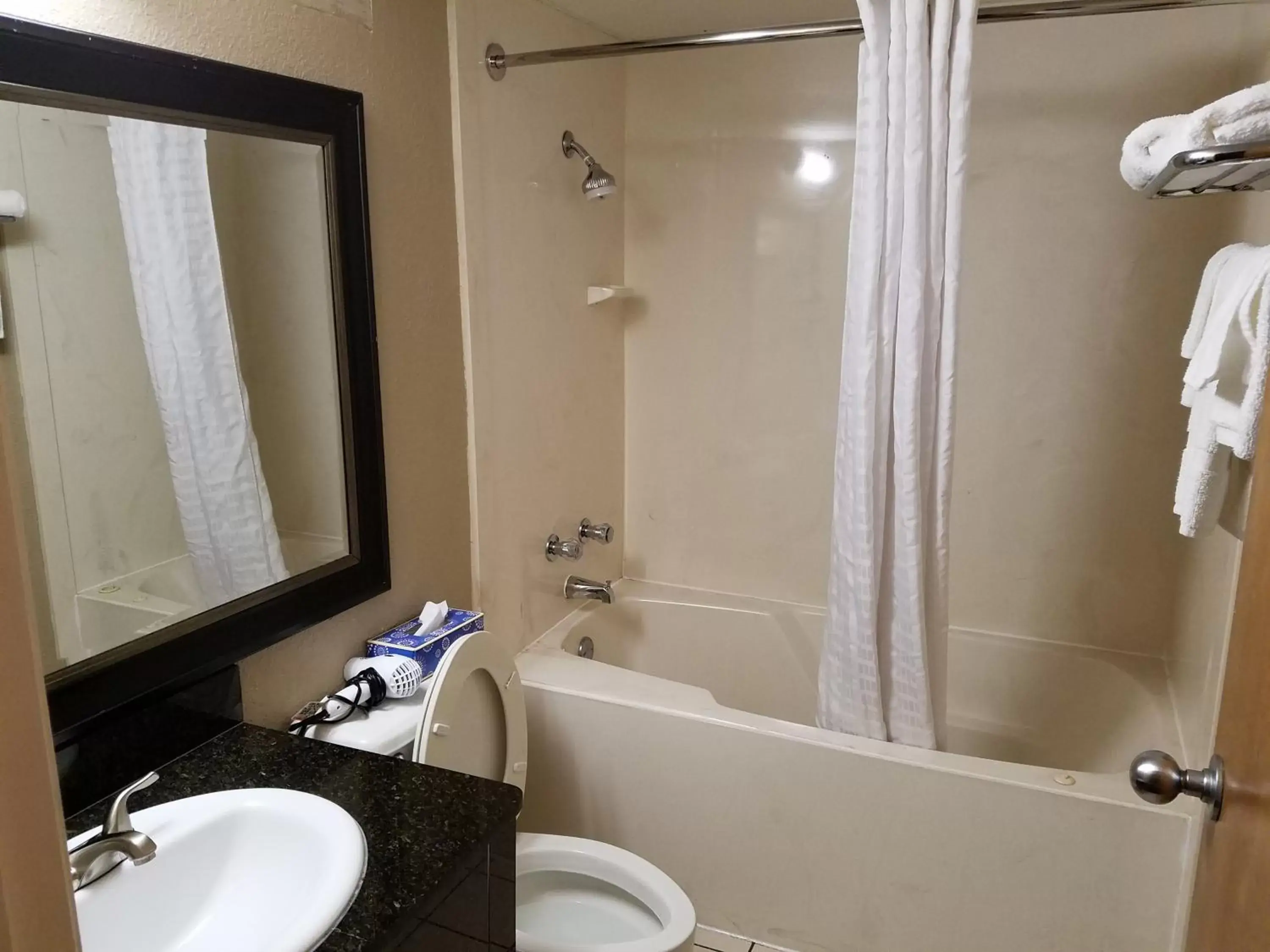 Bathroom in Super 8 by Wyndham Bentonville