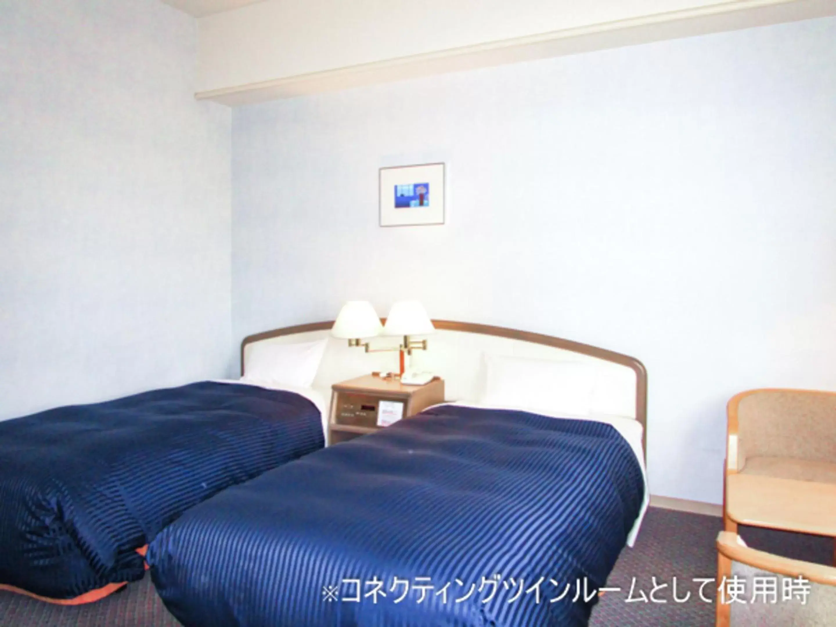 Photo of the whole room, Bed in HOTEL LiVEMAX BUDGET SAPPORO