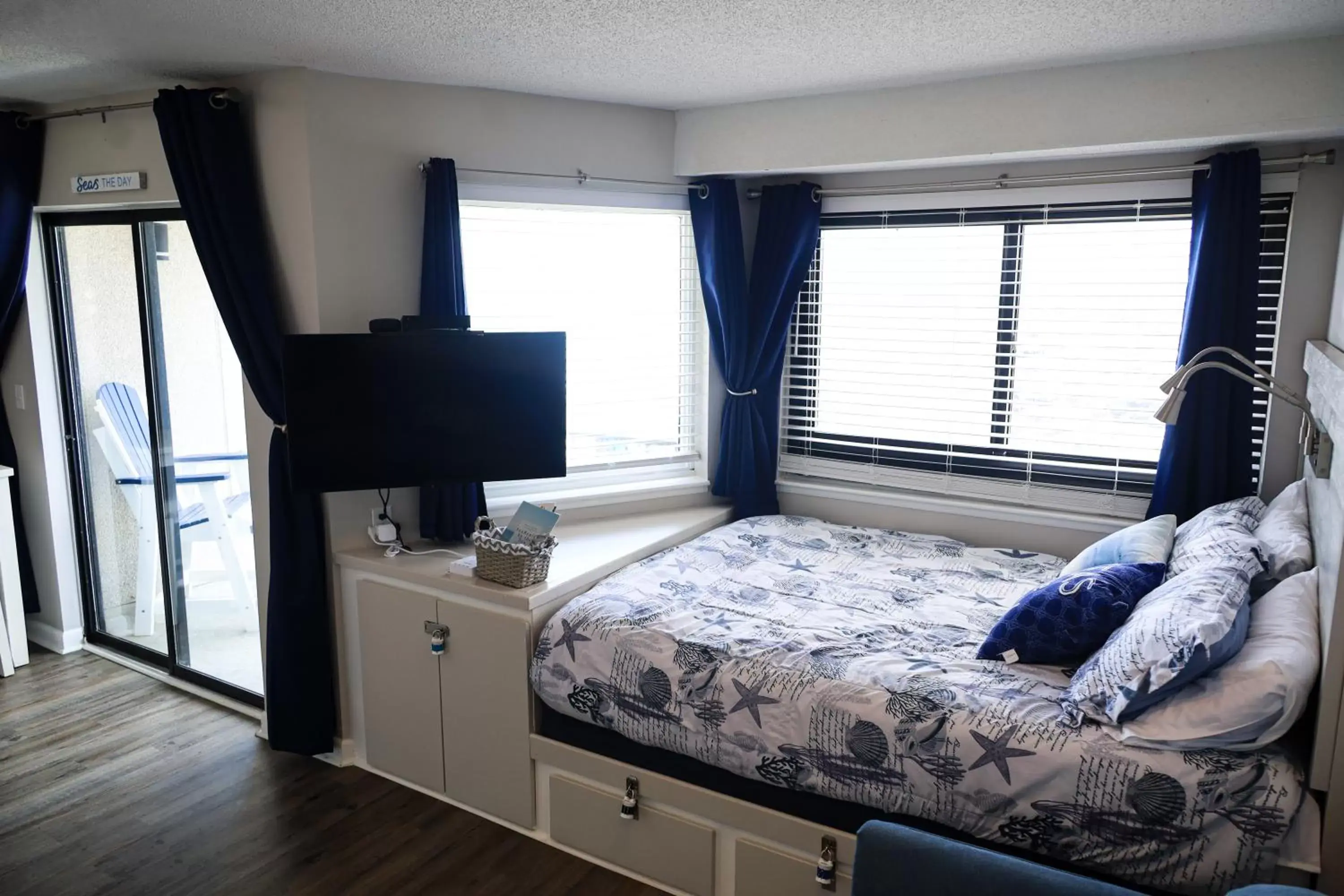 Bed, TV/Entertainment Center in Escape to Myrtle Beach! Massage-Wine-Photoshoot Packages