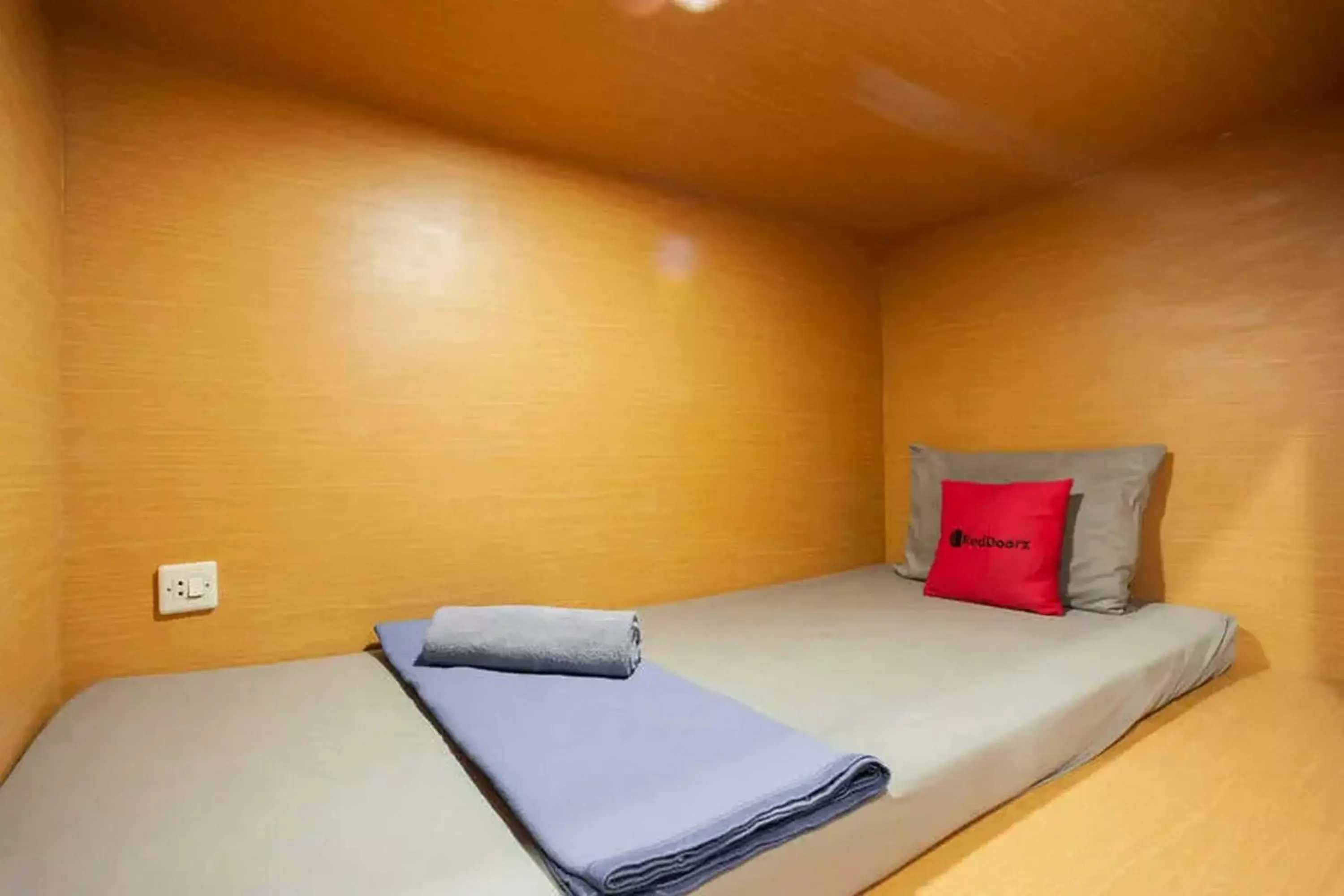 Bedroom, Bed in RedDoorz Hostel near Taman Puring