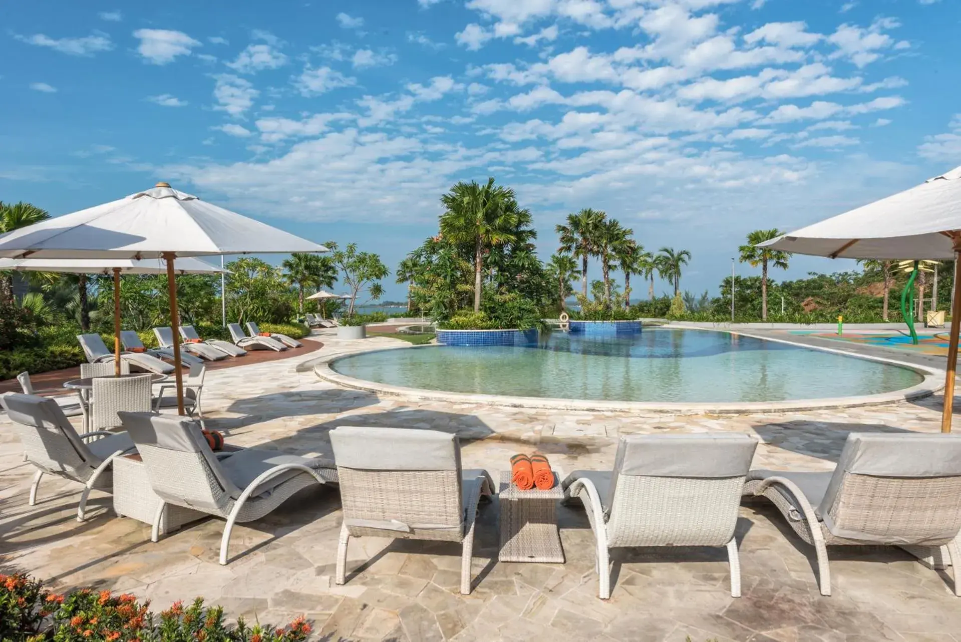 Swimming pool in HARRIS Resort Barelang Batam Swimming pool in HARRIS Resort Barelang Batam