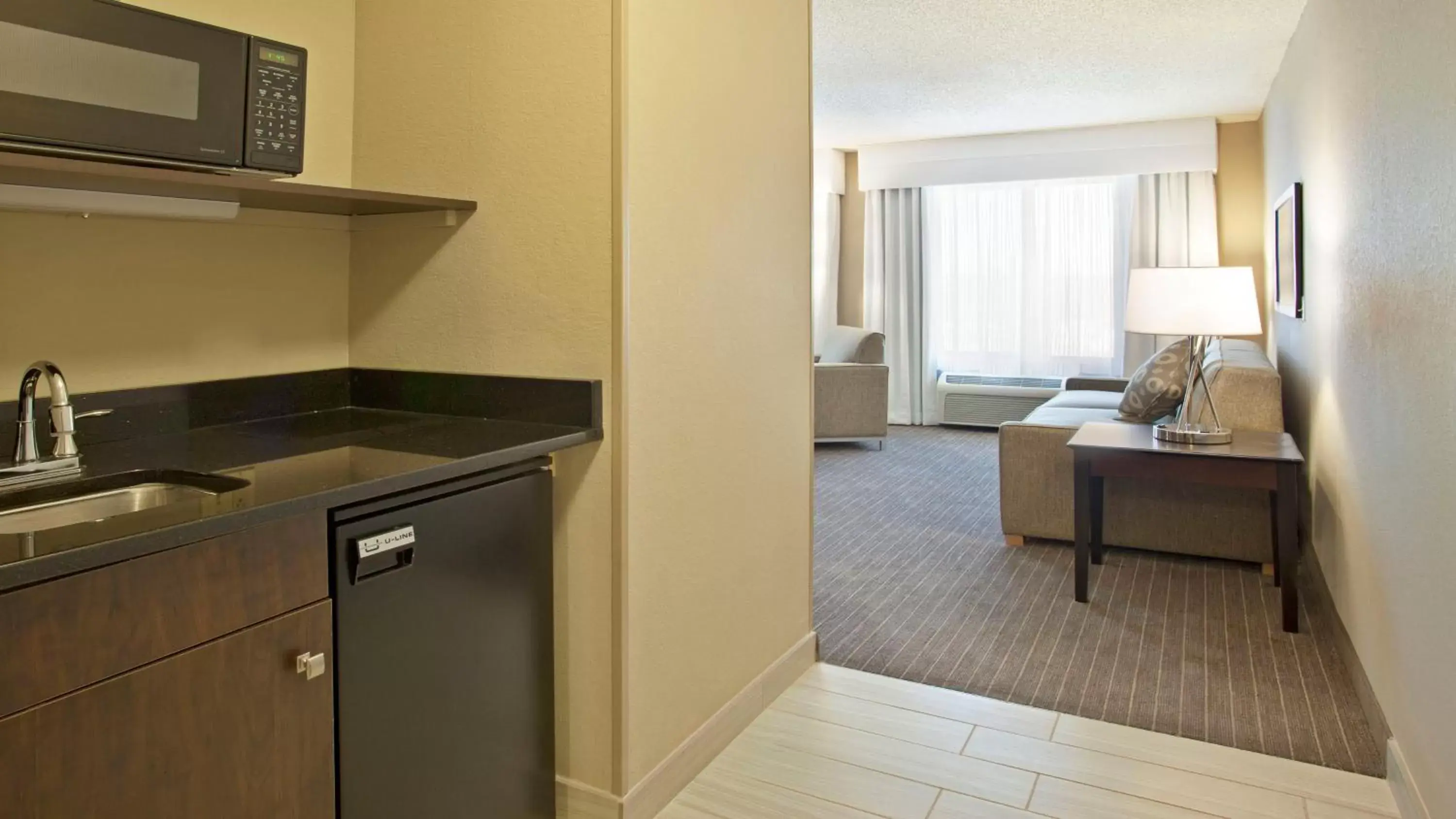Photo of the whole room, Kitchen/Kitchenette in Holiday Inn Express Hotel & Suites Minneapolis - Minnetonka, an IHG Hotel