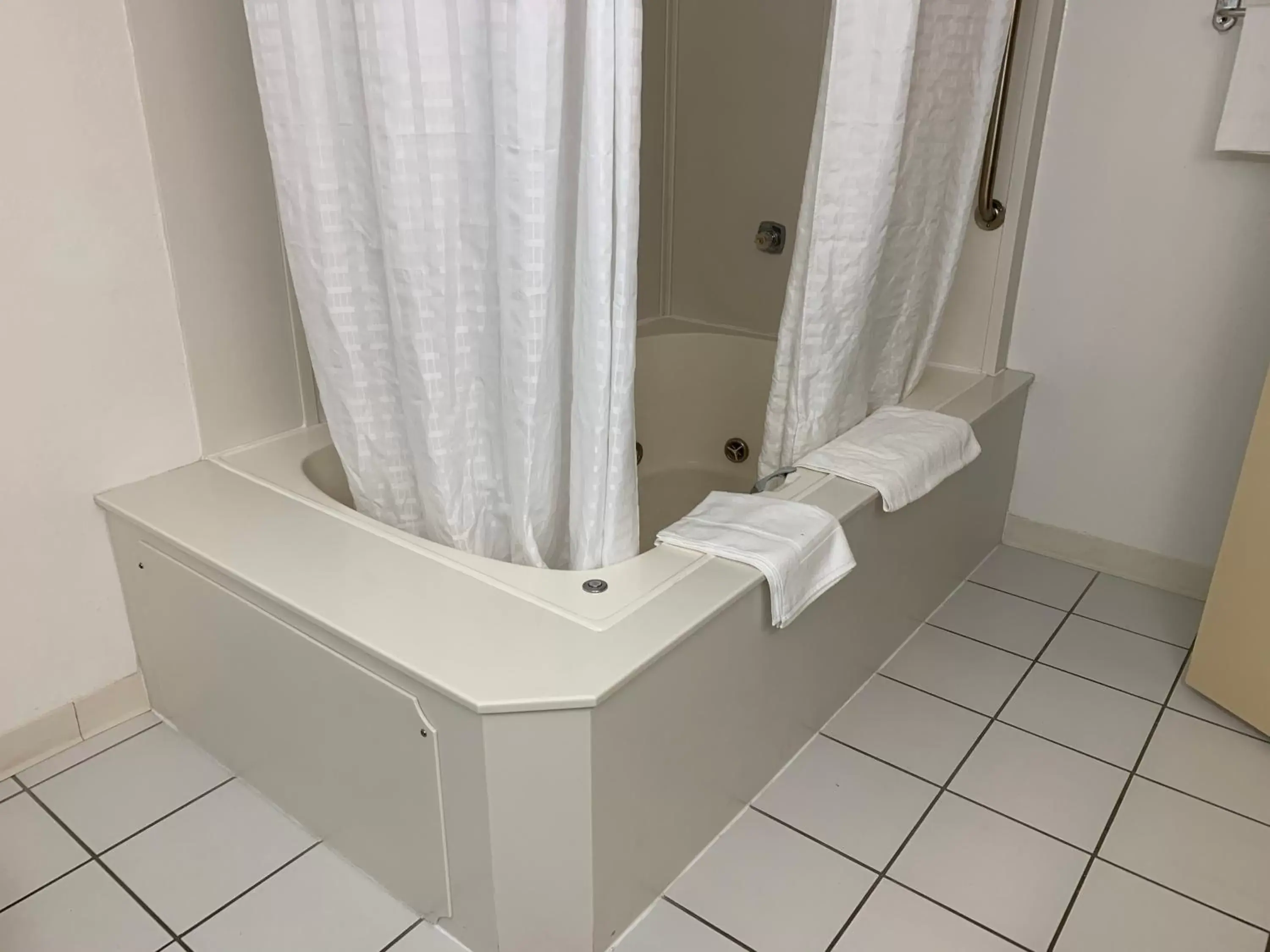 Bathroom in Travelodge by Wyndham Rapid City