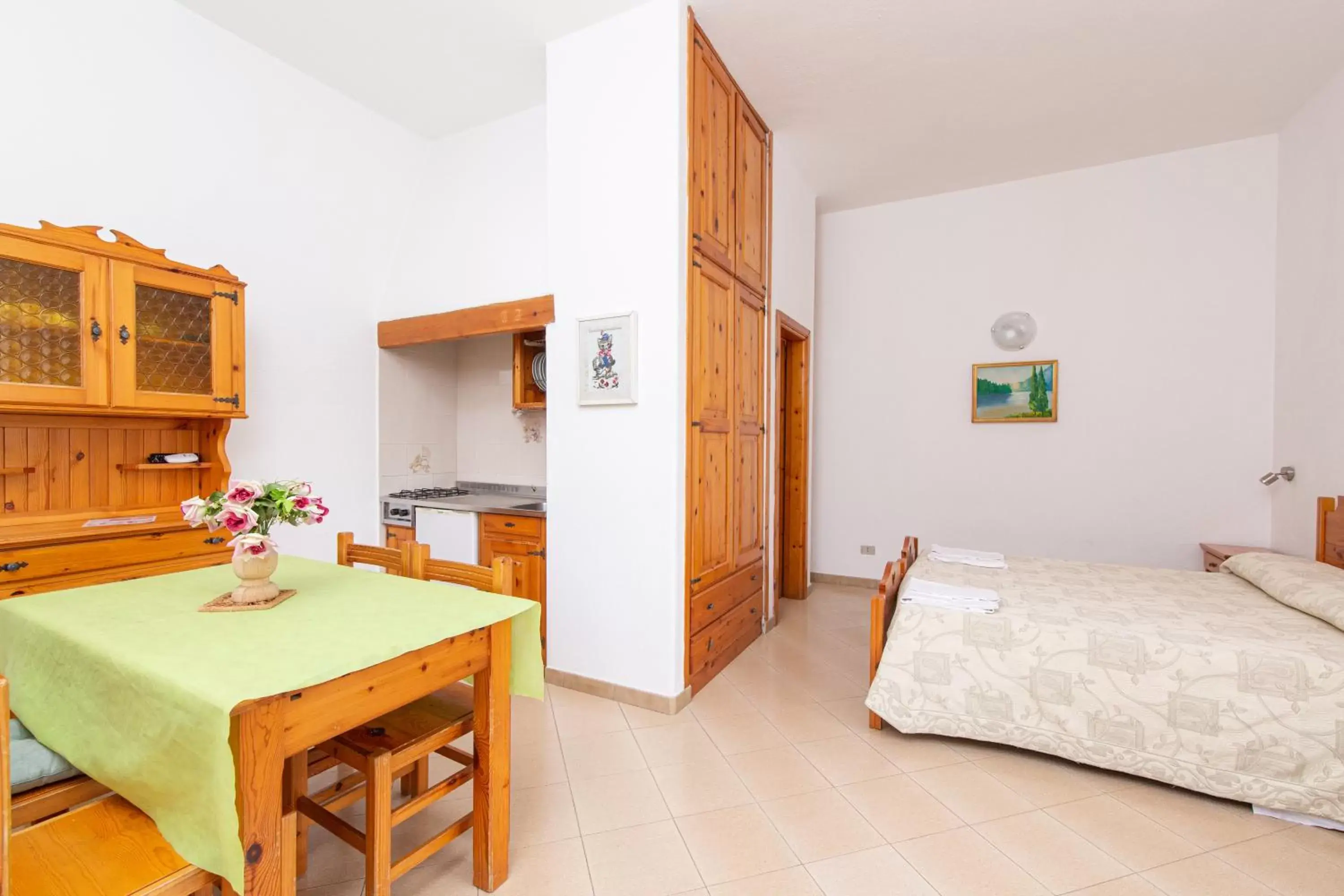 Bedroom, Kitchen/Kitchenette in Residence Villa Tina