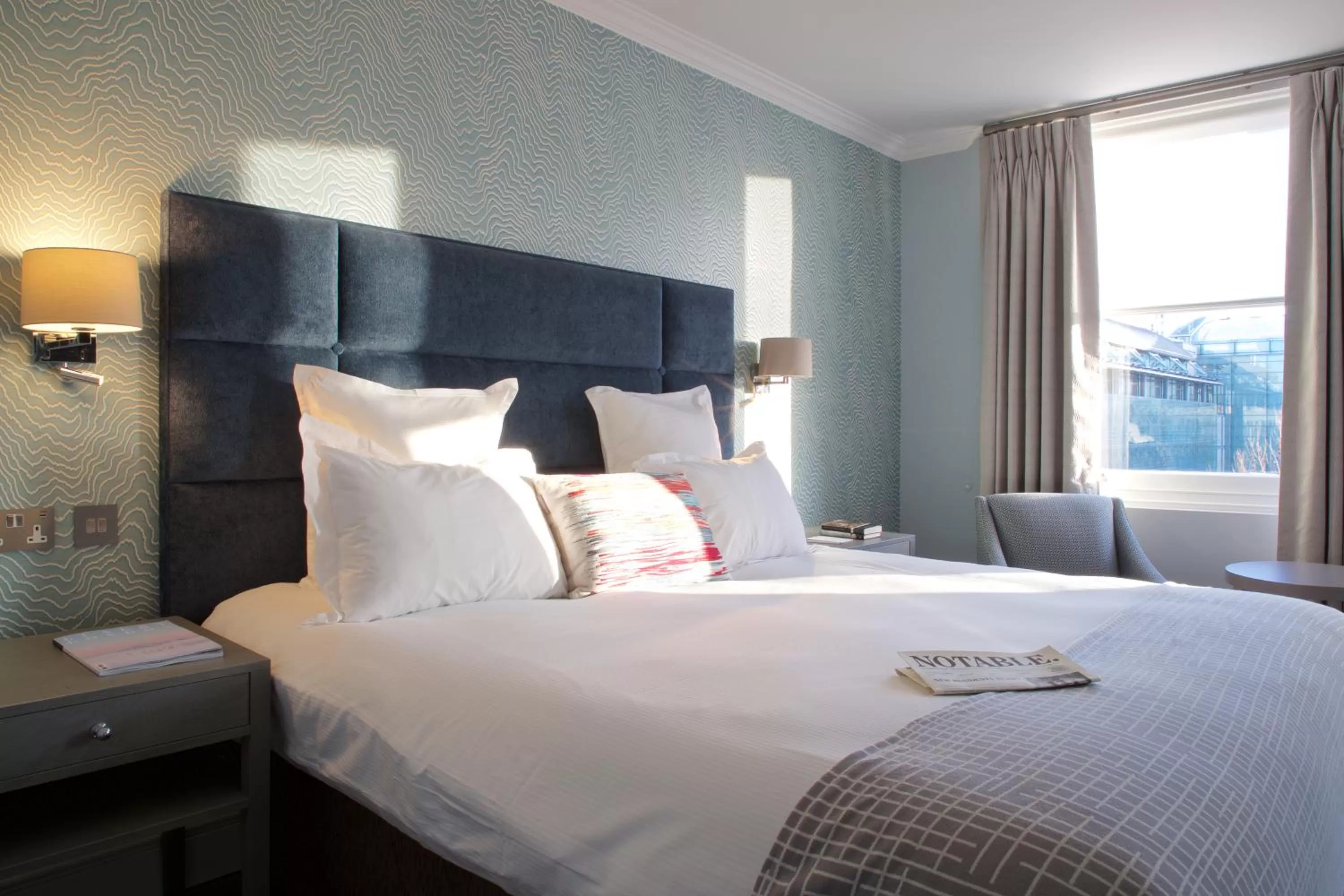 Bed in 54 Queen's Gate Hotel