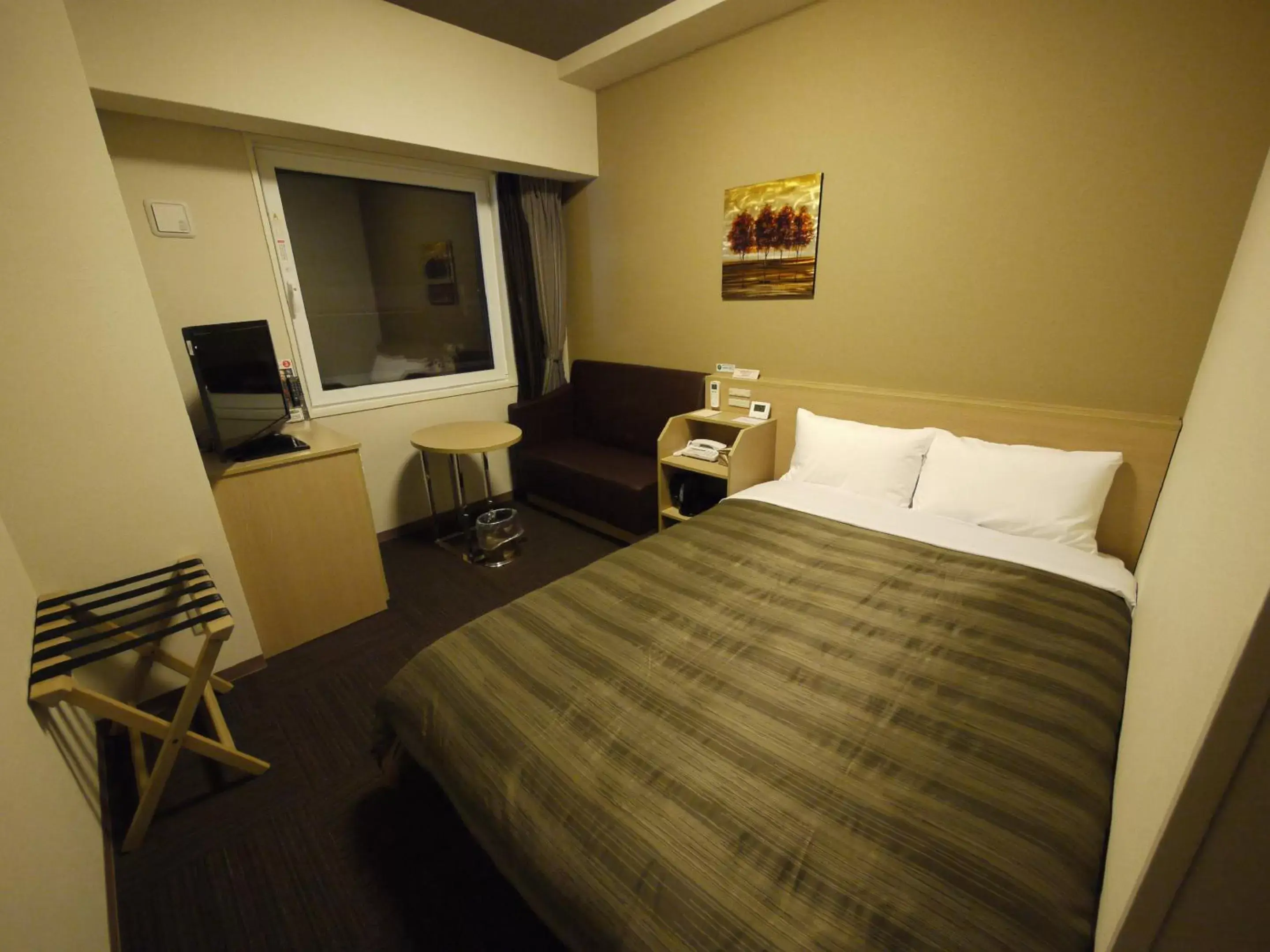 Bed in Hotel Route-Inn Tomakomai Ekimae