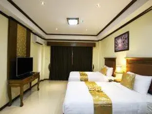 Bed in i Boutique Hotel