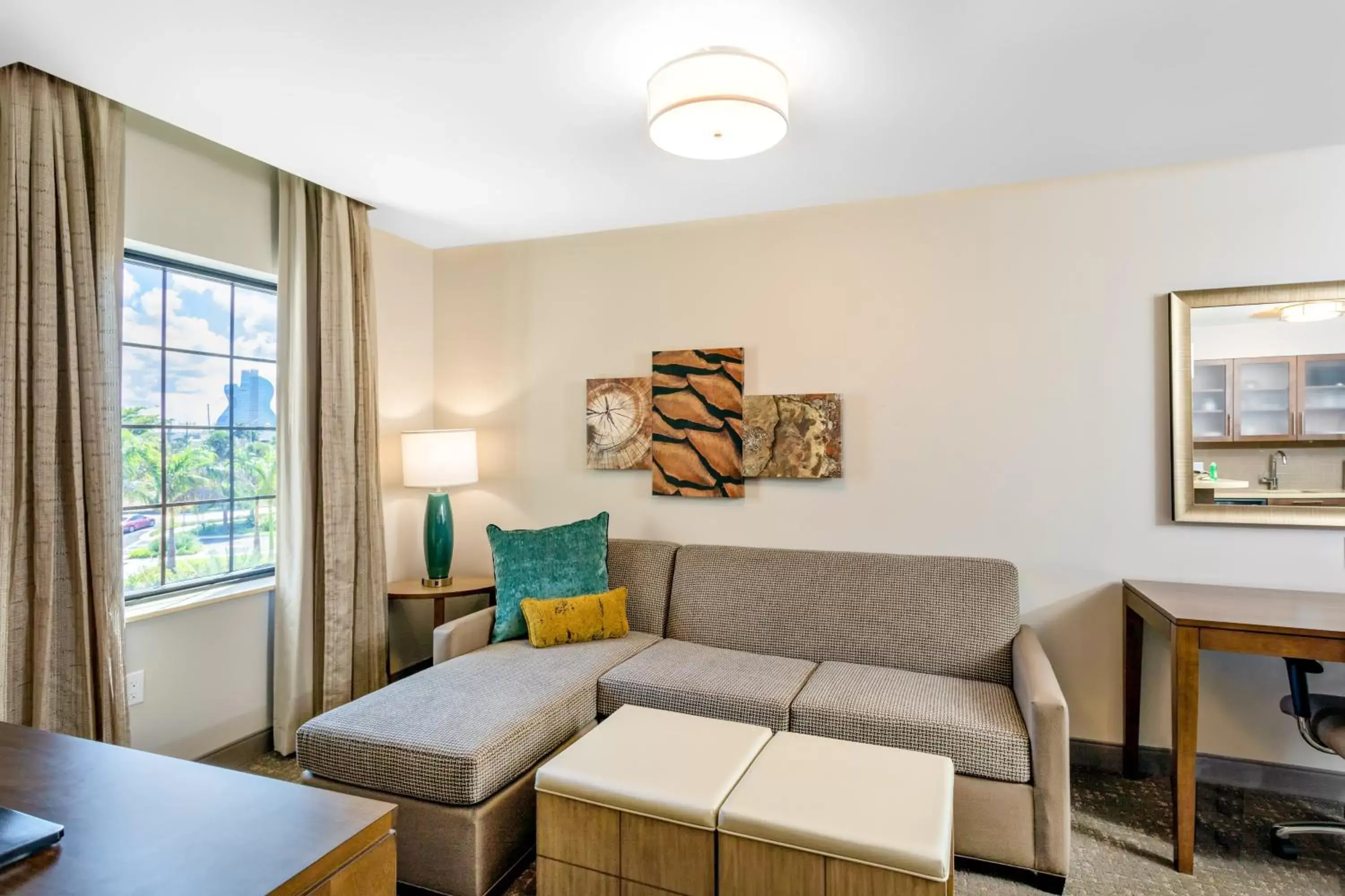 Bedroom, Seating Area in Staybridge Suites - Fort Lauderdale Airport - West, an IHG Hotel
