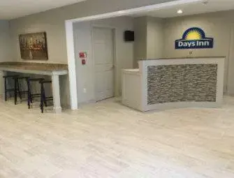 Property logo or sign, Lobby/Reception in Days Inn & Suites by Wyndham Sellersburg