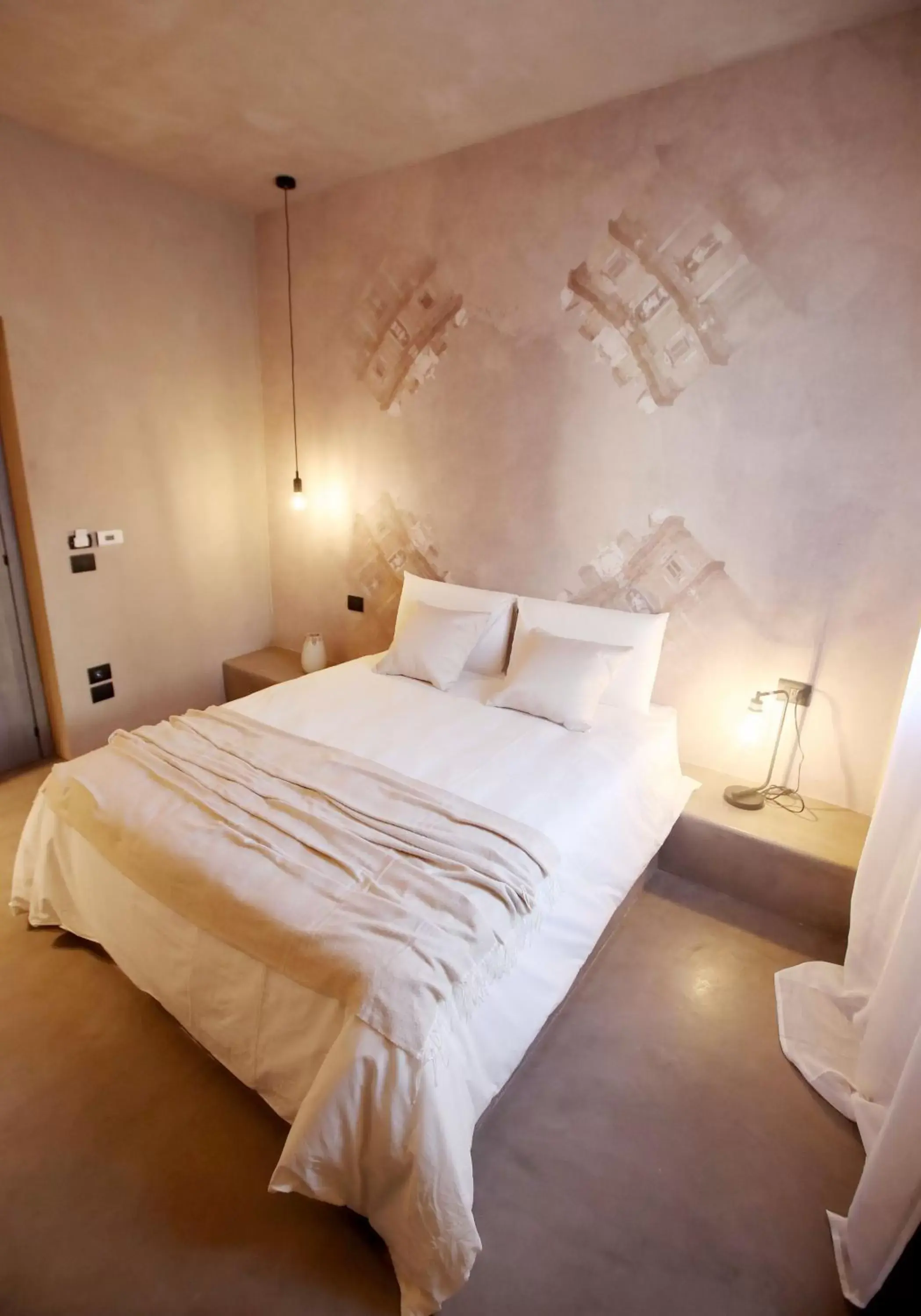 Bed in Casa Nostra Luxury Suites