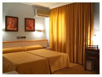 Bed in Hotel Verona