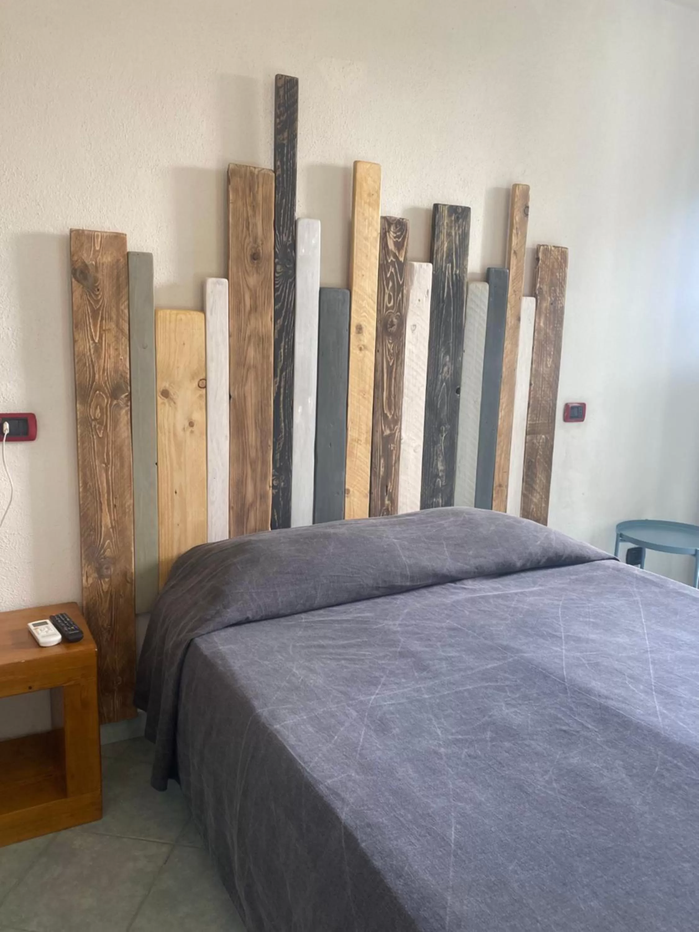 Bed in Black Market Hotel