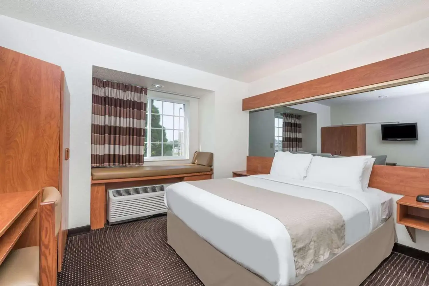 Bedroom, Bed in Microtel Inn & Suites by Wyndham Rice Lake