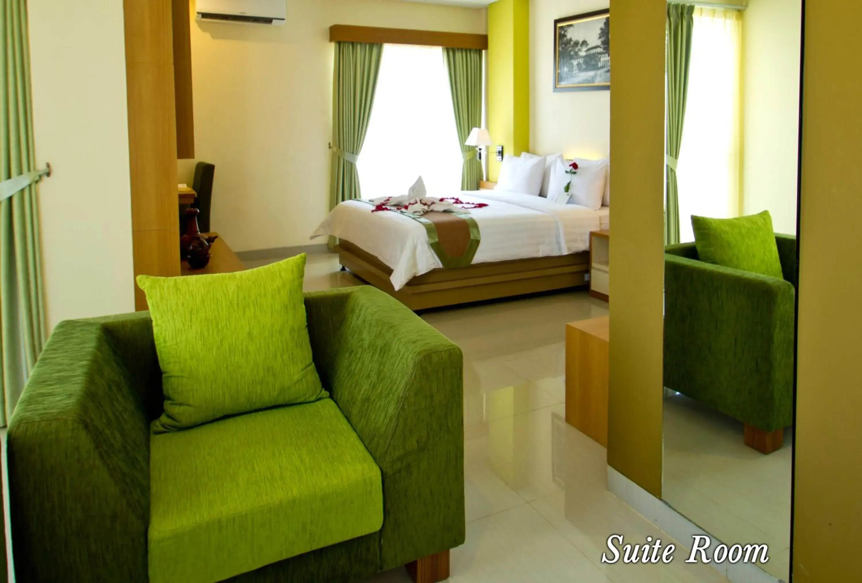 Seating area, Bed in De Batara Hotel