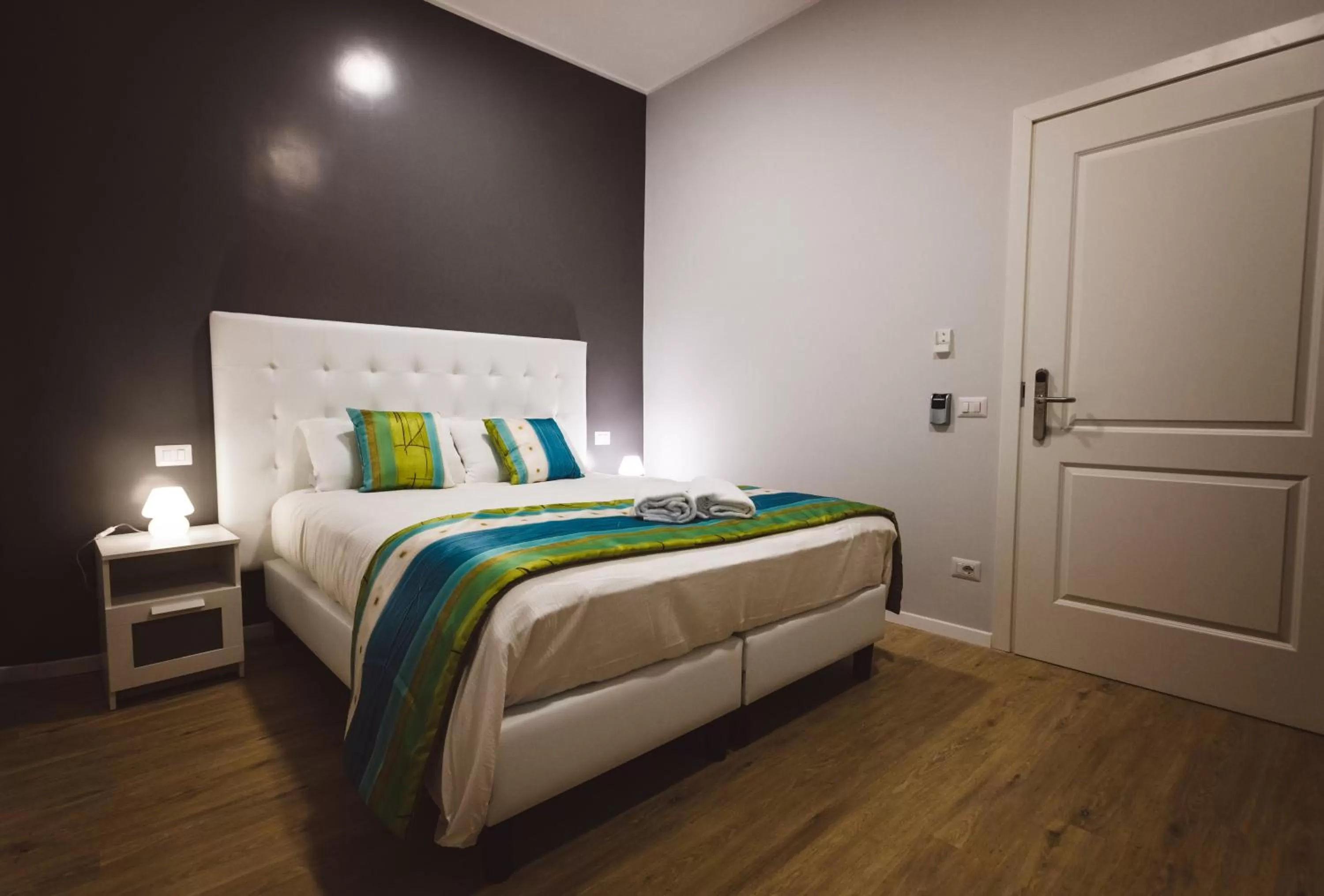 Bed in Angelina Rooms in Rome