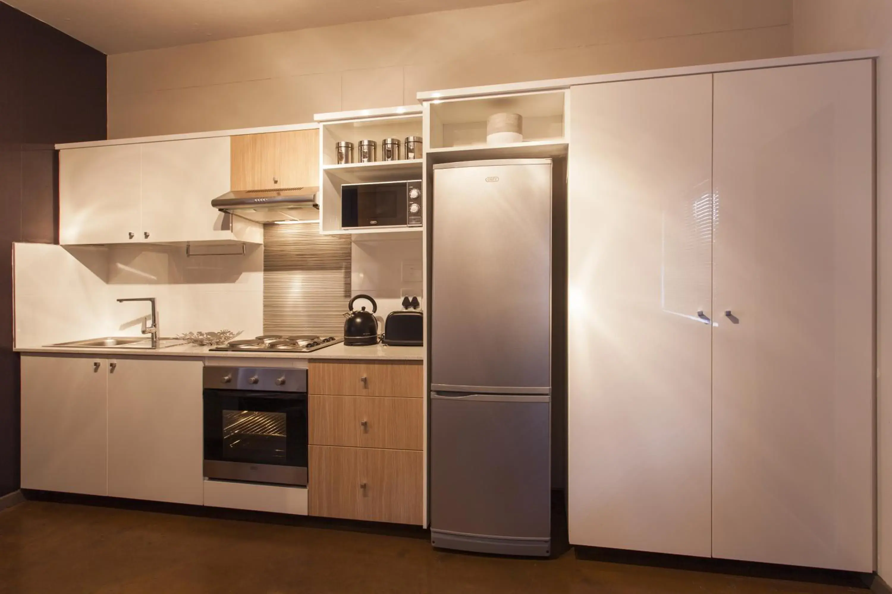 Living room, Kitchen/Kitchenette in Akanani Apartments