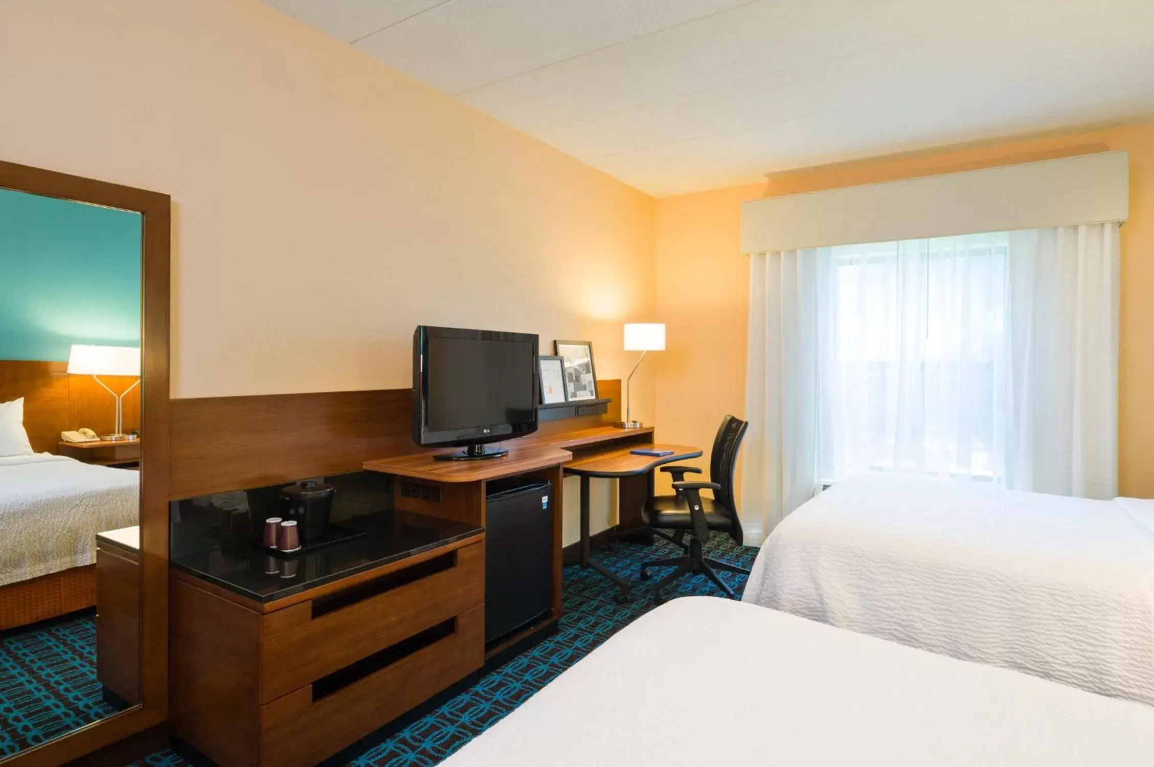 Photo of the whole room, TV/Entertainment Center in Fairfield Inn by Marriott Laurel