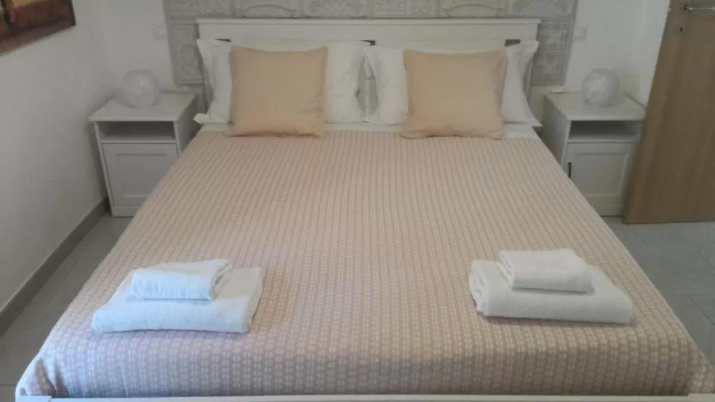 Bed in Carpe Diem B&B e Case Vacanza