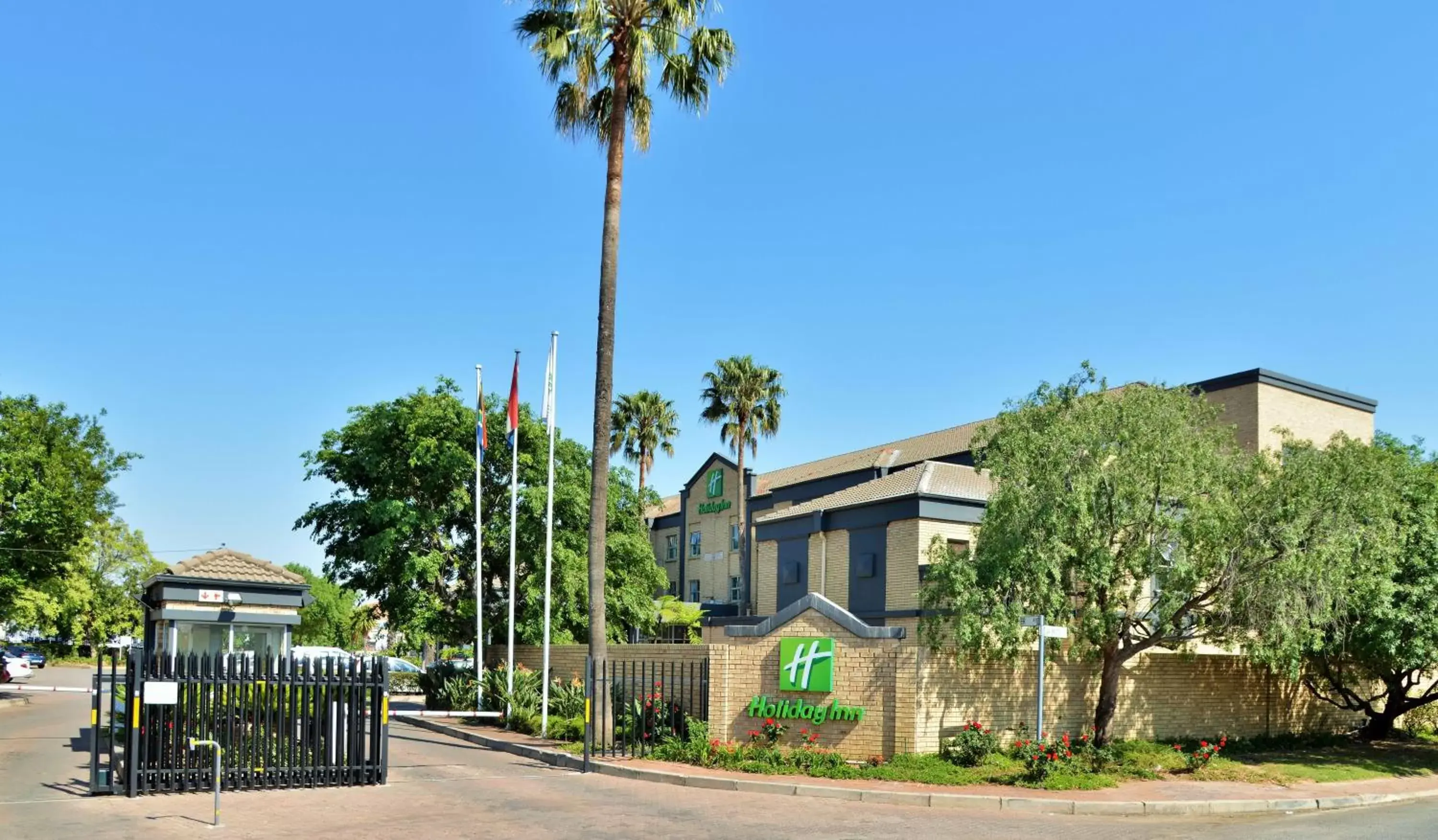 Property building in Holiday Inn Johannesburg OR Tambo Airport Hotel by IHG Property building in Holiday Inn Johannesburg OR Tambo Airport Hotel by IHG