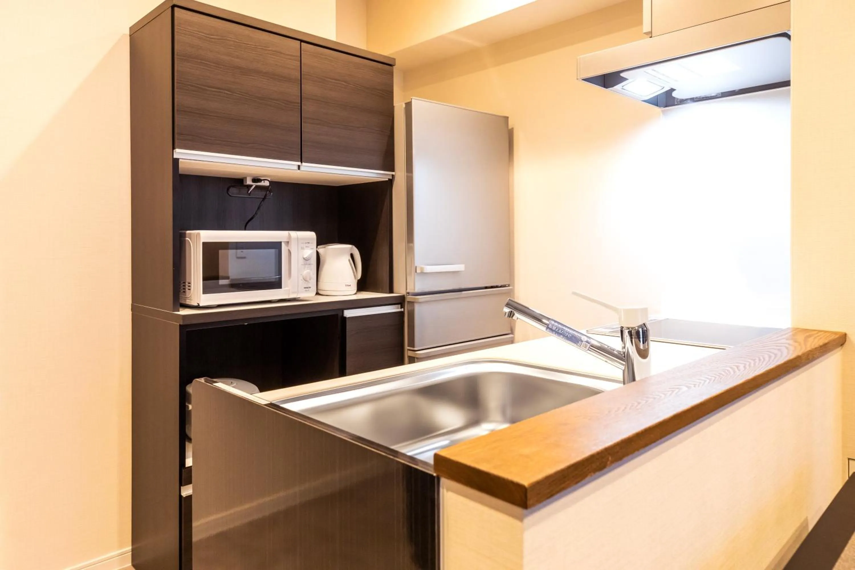 Kitchen or kitchenette in LAPIN MIHAMA Residence Hotel