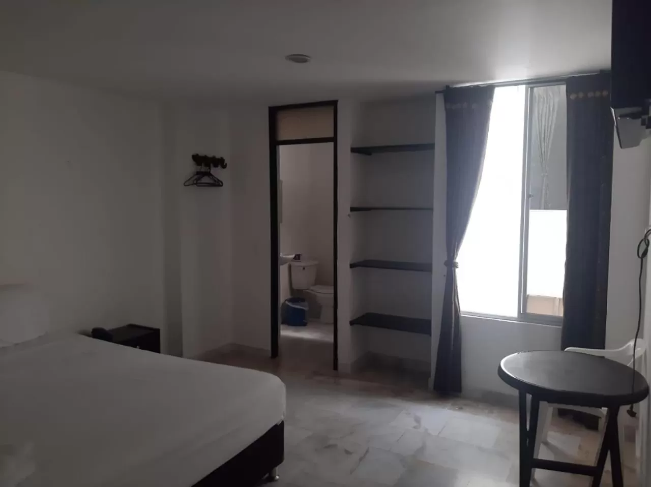 Bed in Blue Star Hotel