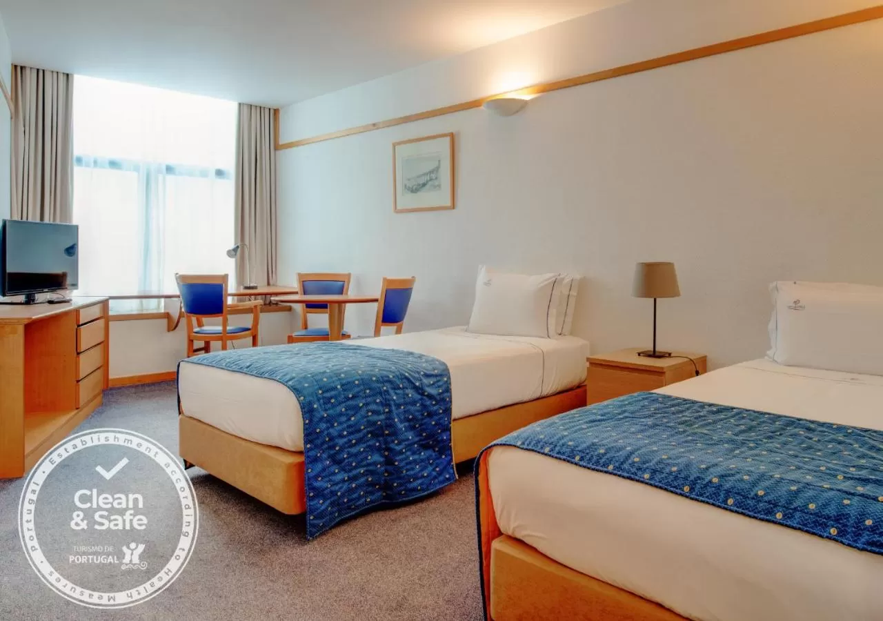 Bed in VIP Executive Eden Aparthotel