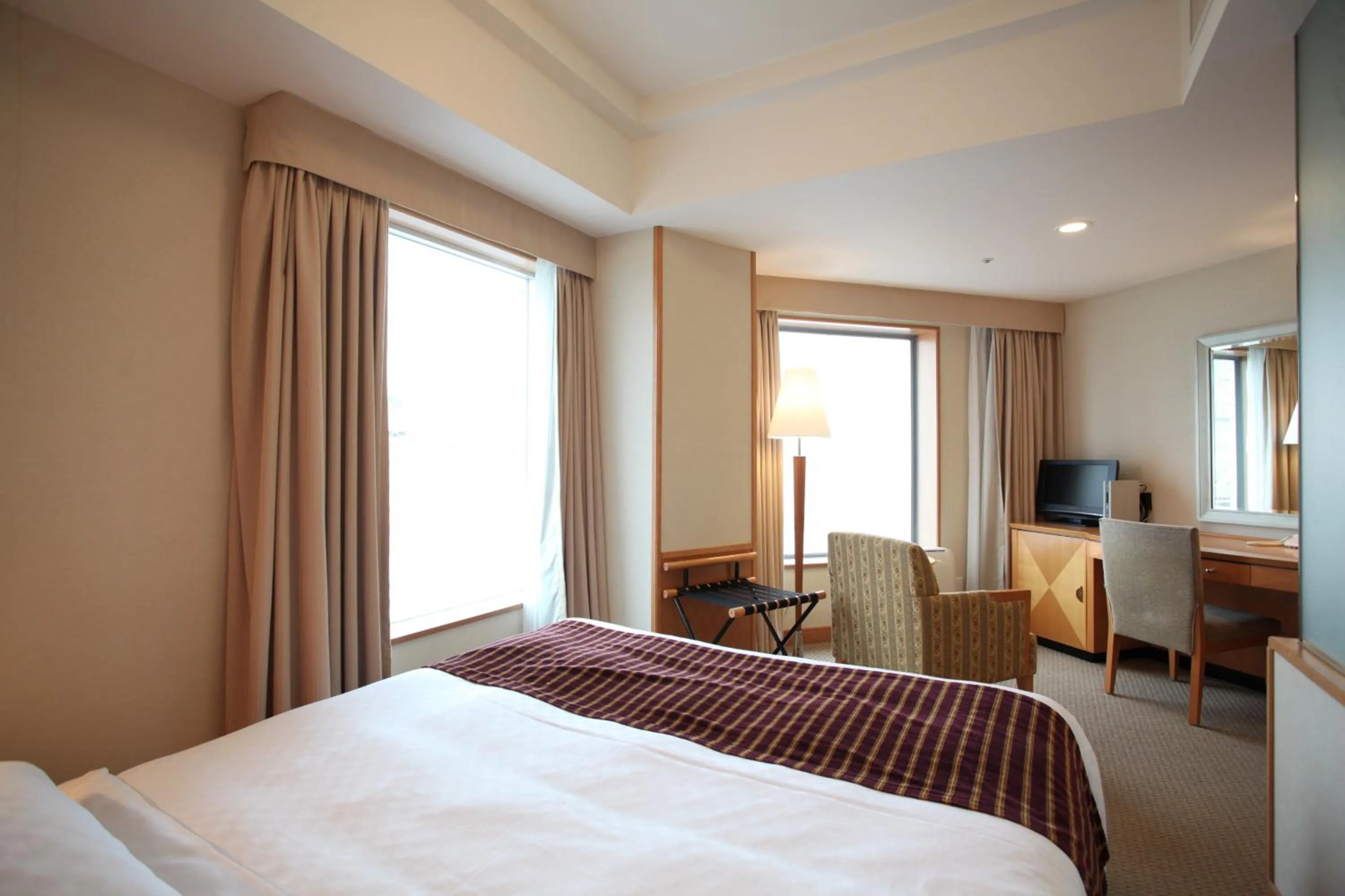 Photo of the whole room, Bed in JR Hotel Clement Takamatsu