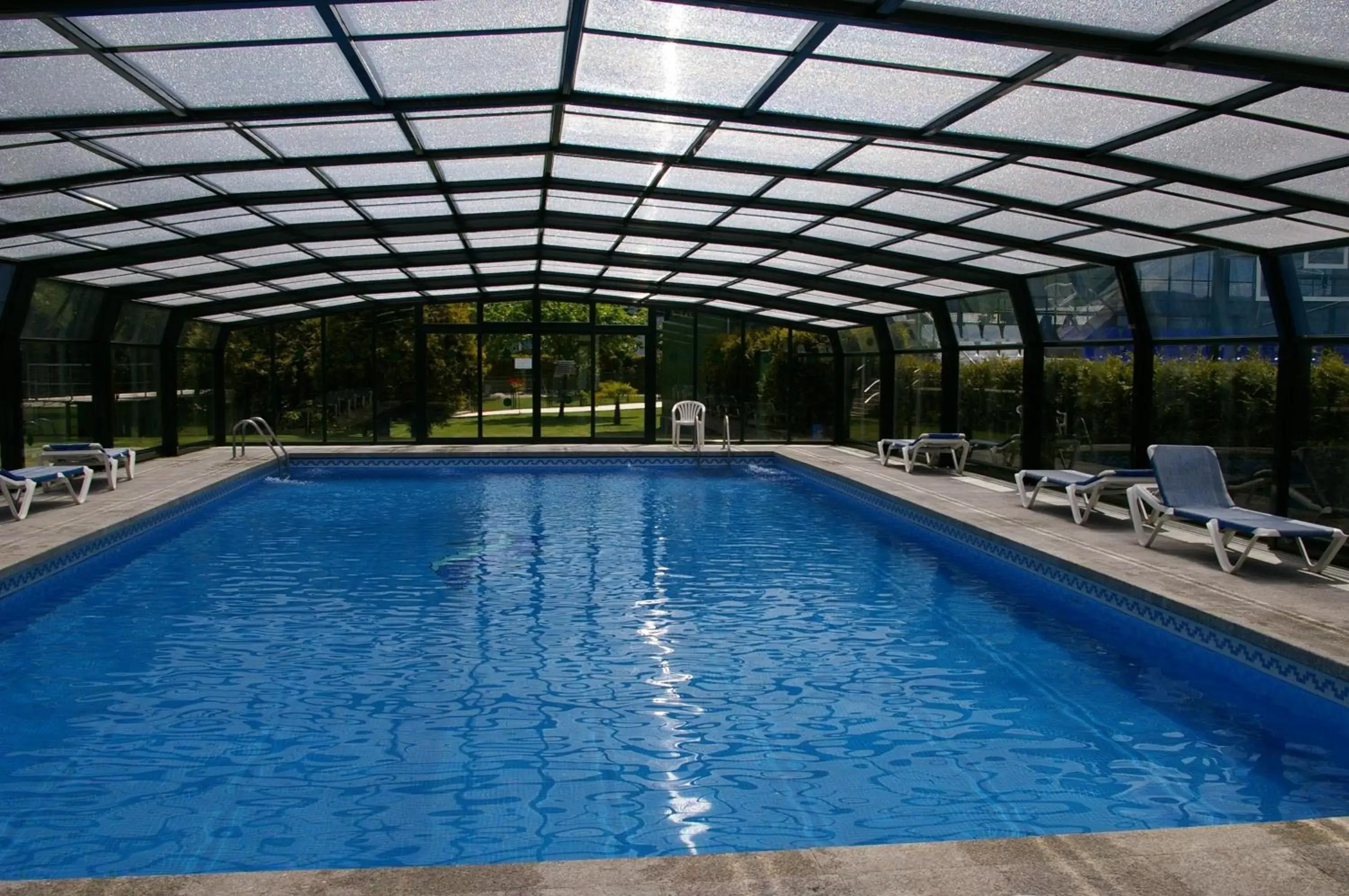 Swimming Pool in Hotel Auditorio Santiago & Spa