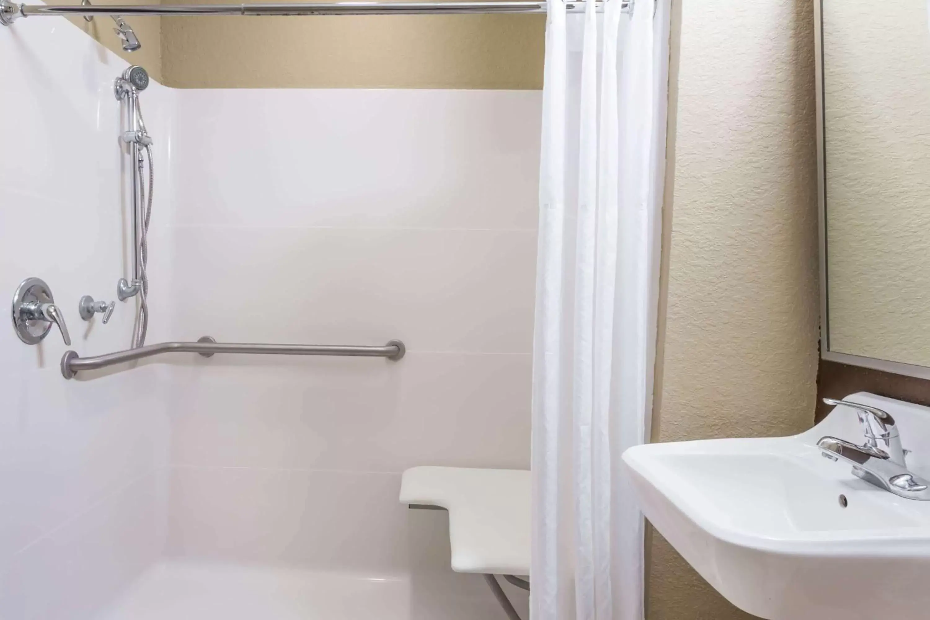 Bathroom in Microtel Inn & Suites by Wyndham Jacksonville Airport