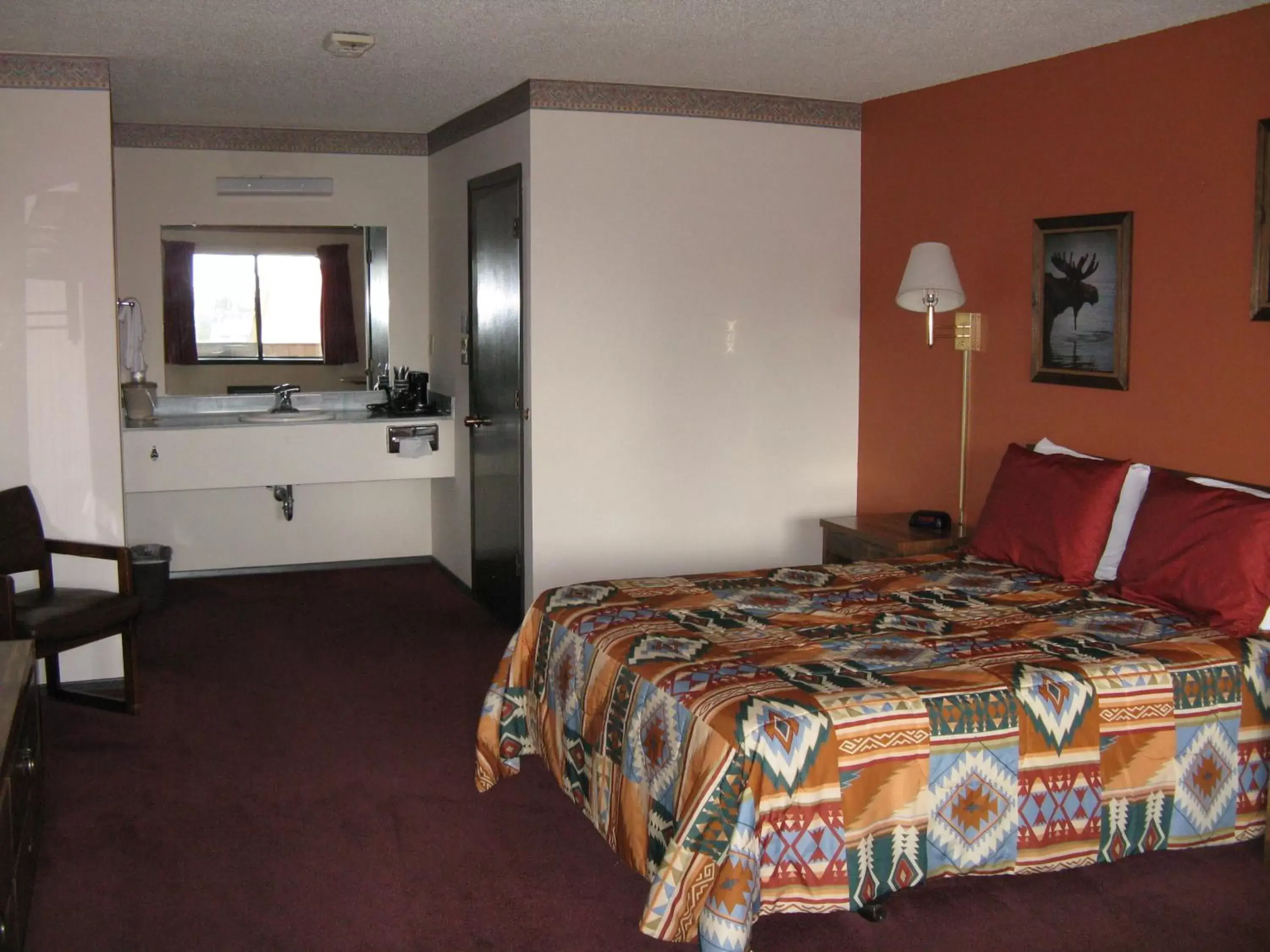 Photo of the whole room, Bed in Branding Iron Motel